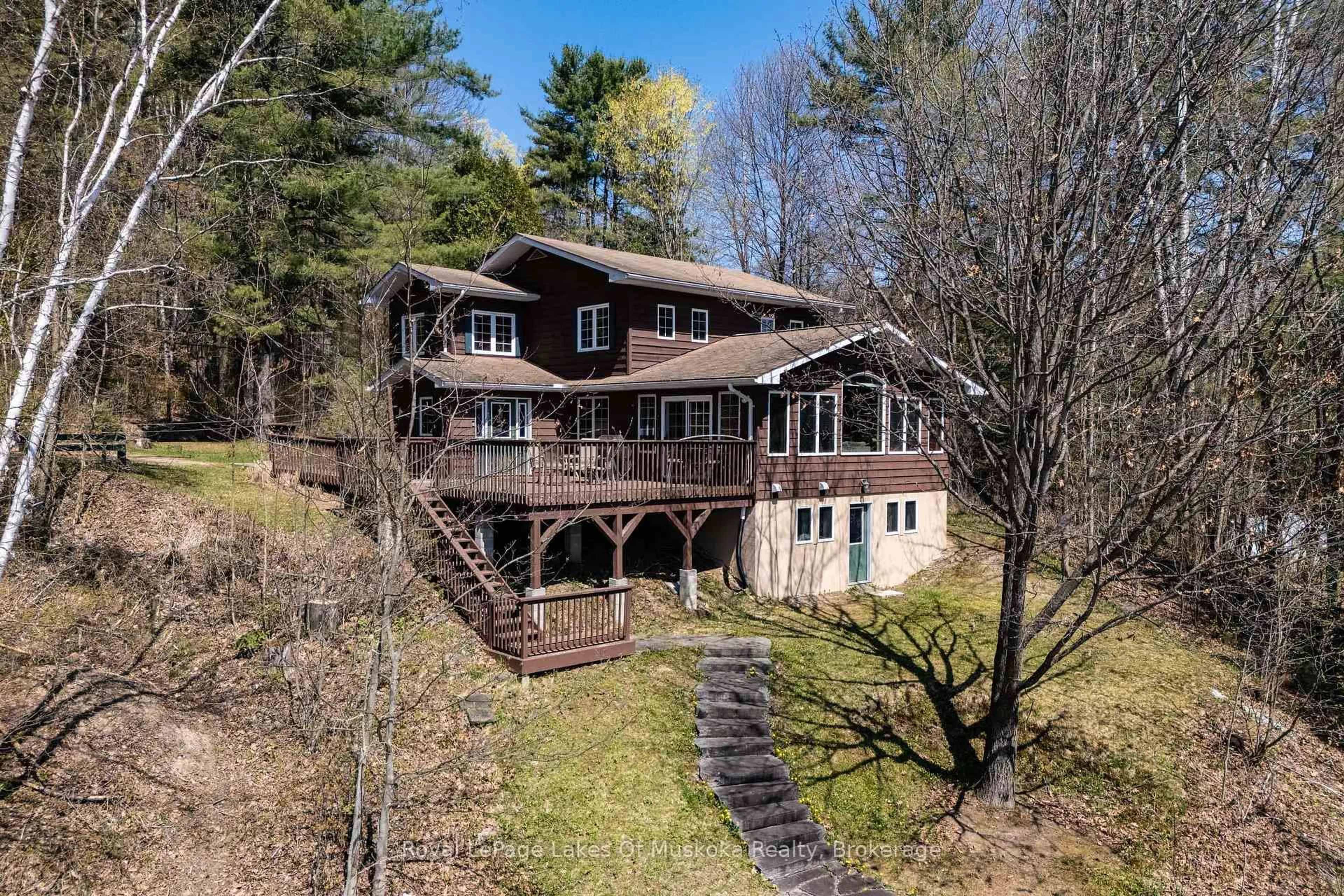 A pic from outside/outdoor area/front of a property/back of a property/a pic from drone, water/lake/river/ocean view for 1128 Kawagama Lake Rd, Algonquin Highlands Ontario P0A 1E0