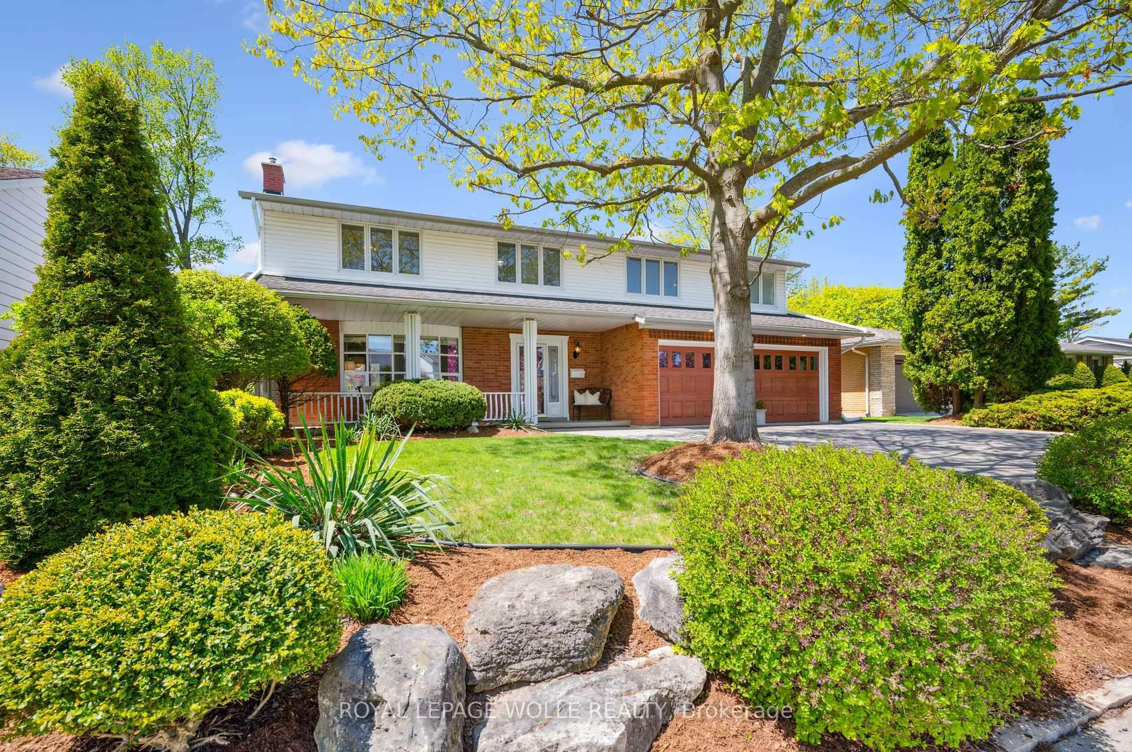Home with brick exterior material, street for 22 Eastwood Dr, Kitchener Ontario N2A 1Z9