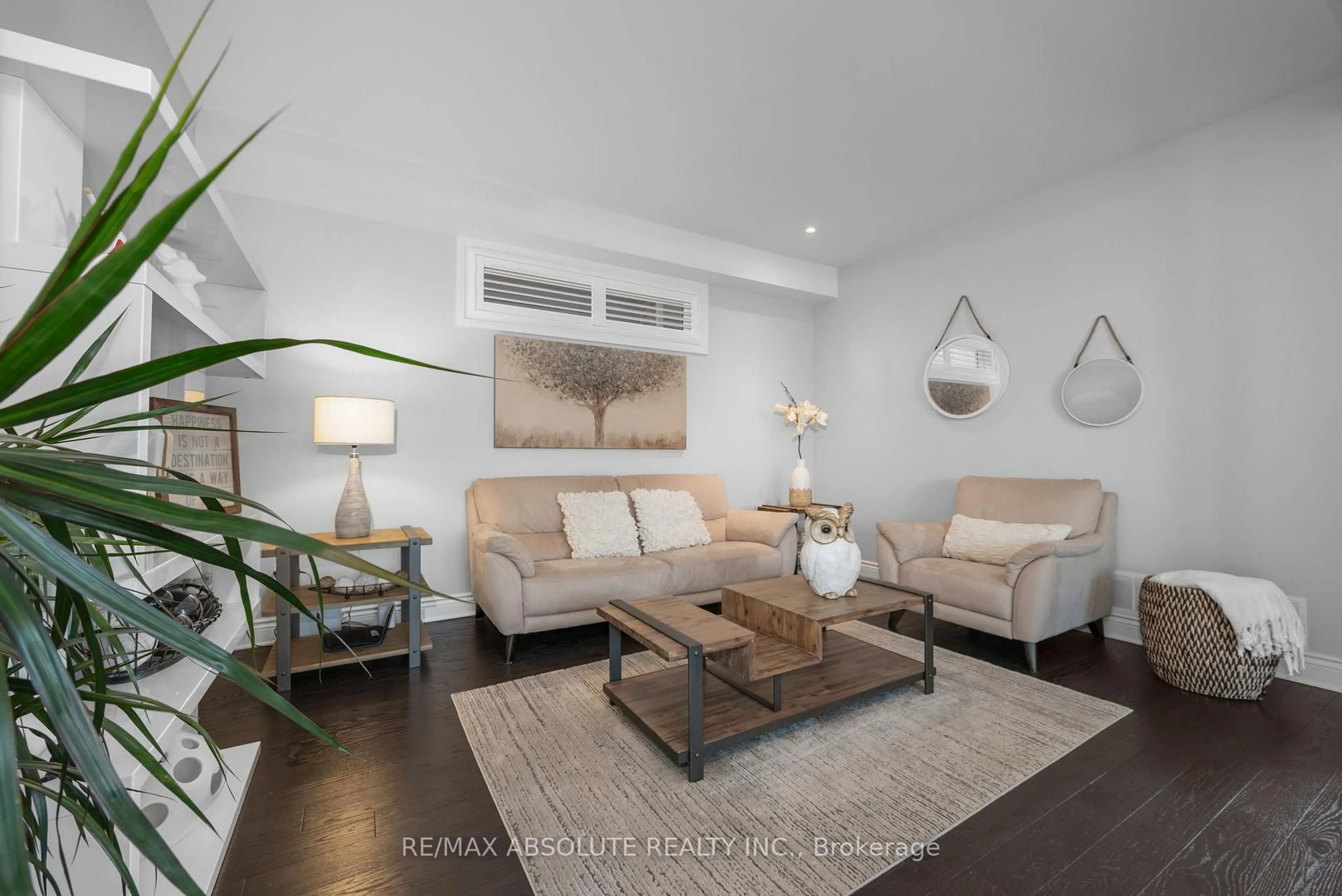 Living room with furniture, wood/laminate floor for 801 Shasta St, Gloucester Ontario K1T 0L3