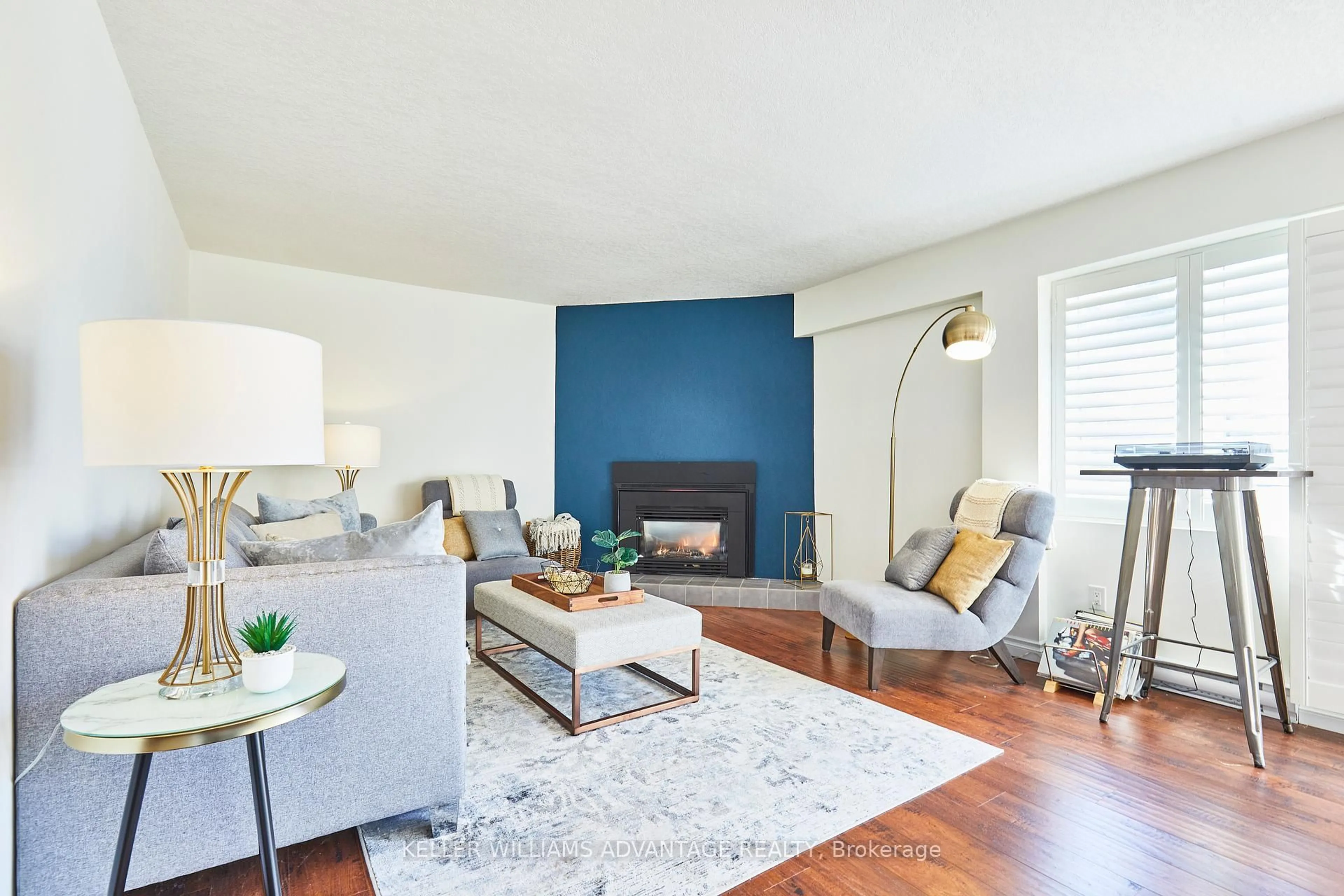 Living room with furniture, wood/laminate floor for 209472 Highway 26 N/A #59, Blue Mountains Ontario L9Y 0V3