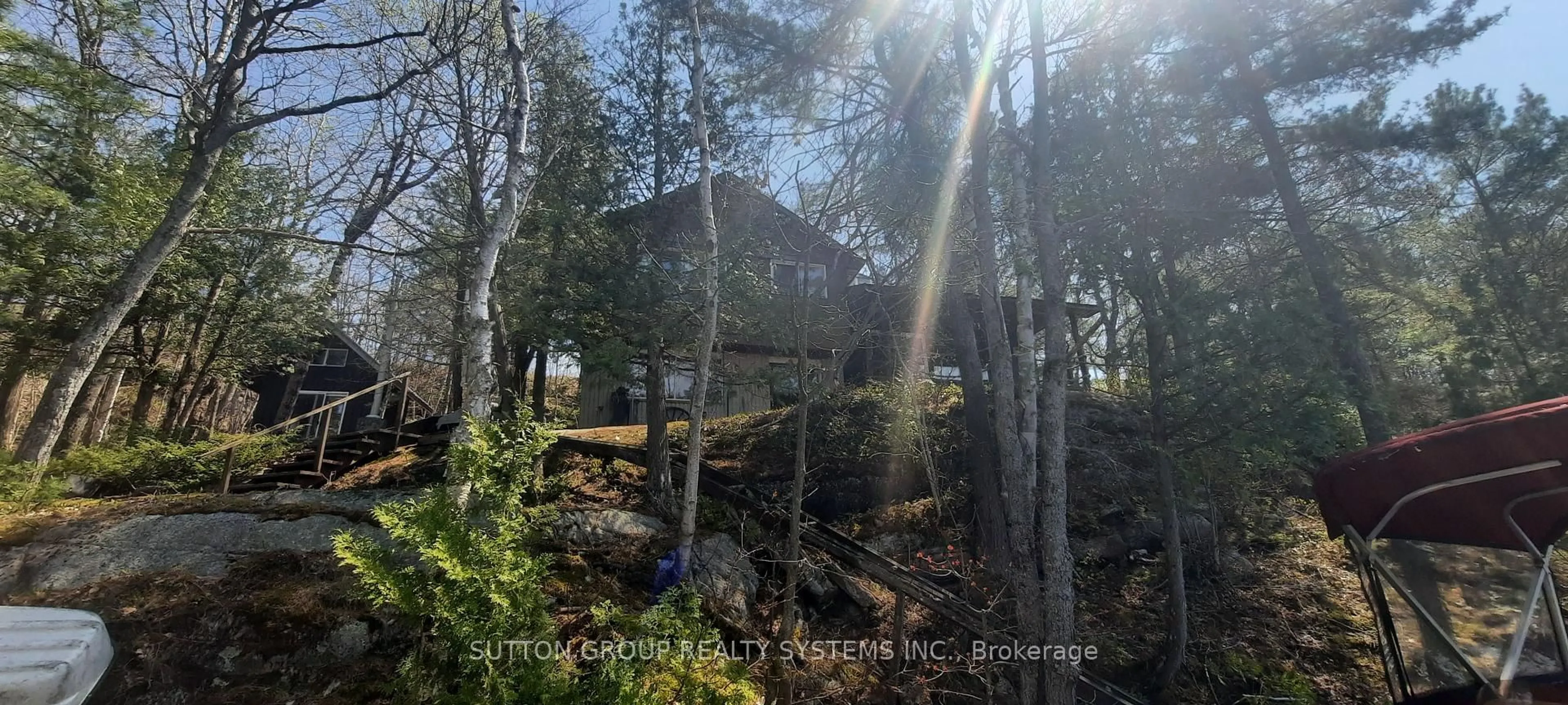 A pic from outside/outdoor area/front of a property/back of a property/a pic from drone, forest/trees view for 55 Healey Lake Water N/A, The Archipelago Ontario P2A 0B7