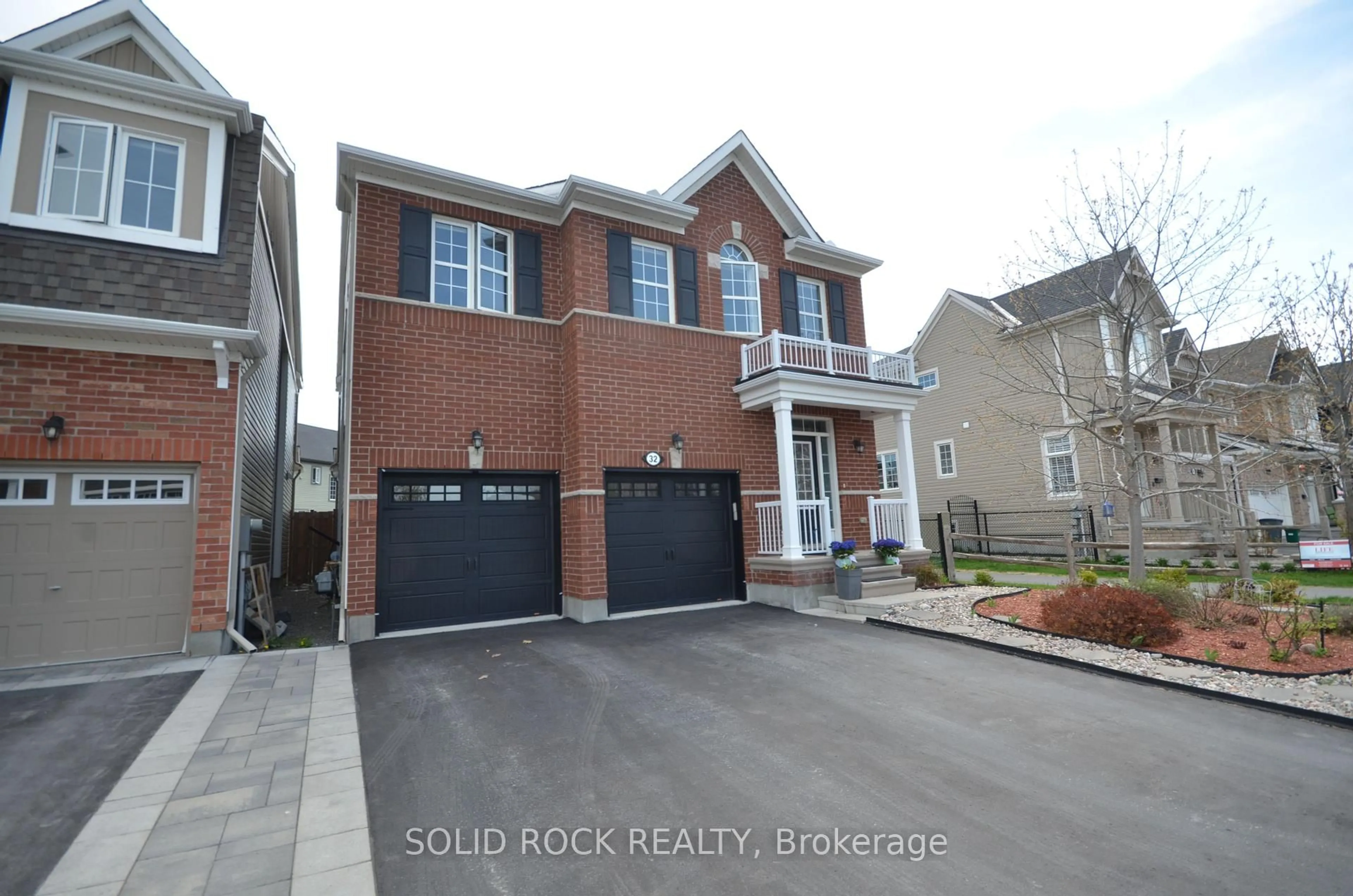 Home with brick exterior material, street for 32 Solaris Dr, Ottawa Ontario K2M 0L6