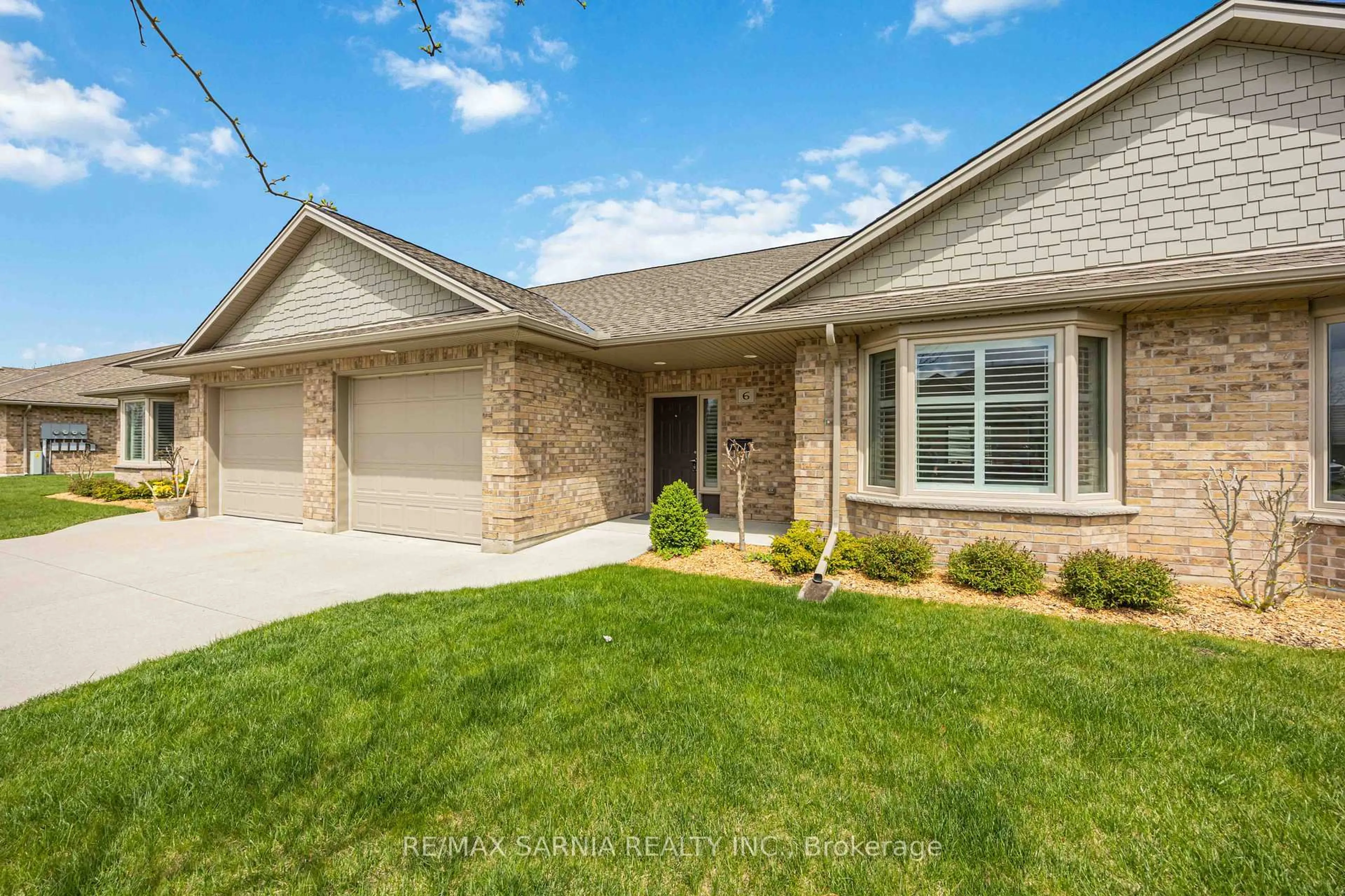 Home with brick exterior material, street for 5969 Townsend Line #6, Lambton Shores Ontario N0N 1J0