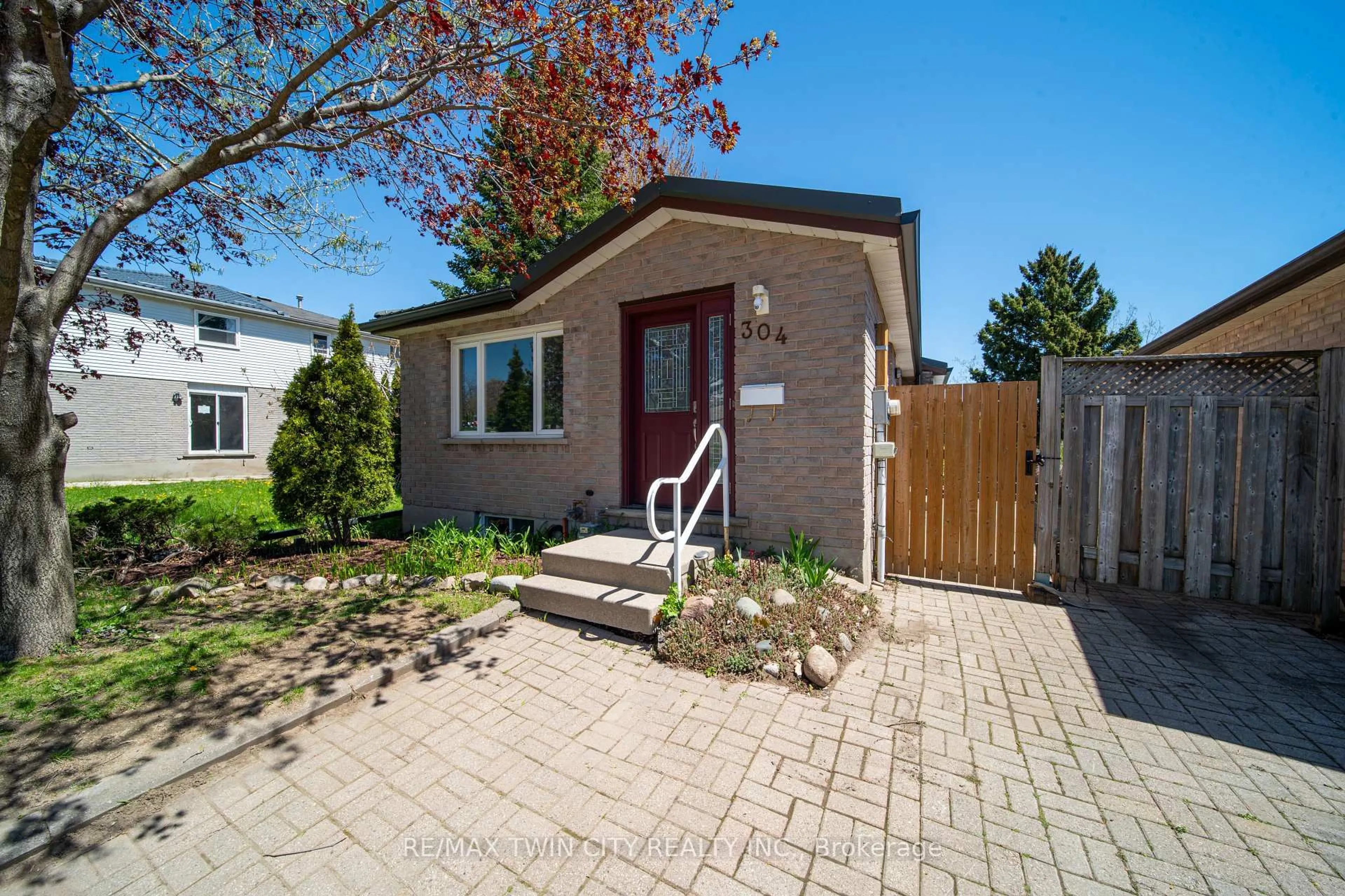 Home with brick exterior material, street for 304 Dinison Pl, Kitchener Ontario N2E 3A6