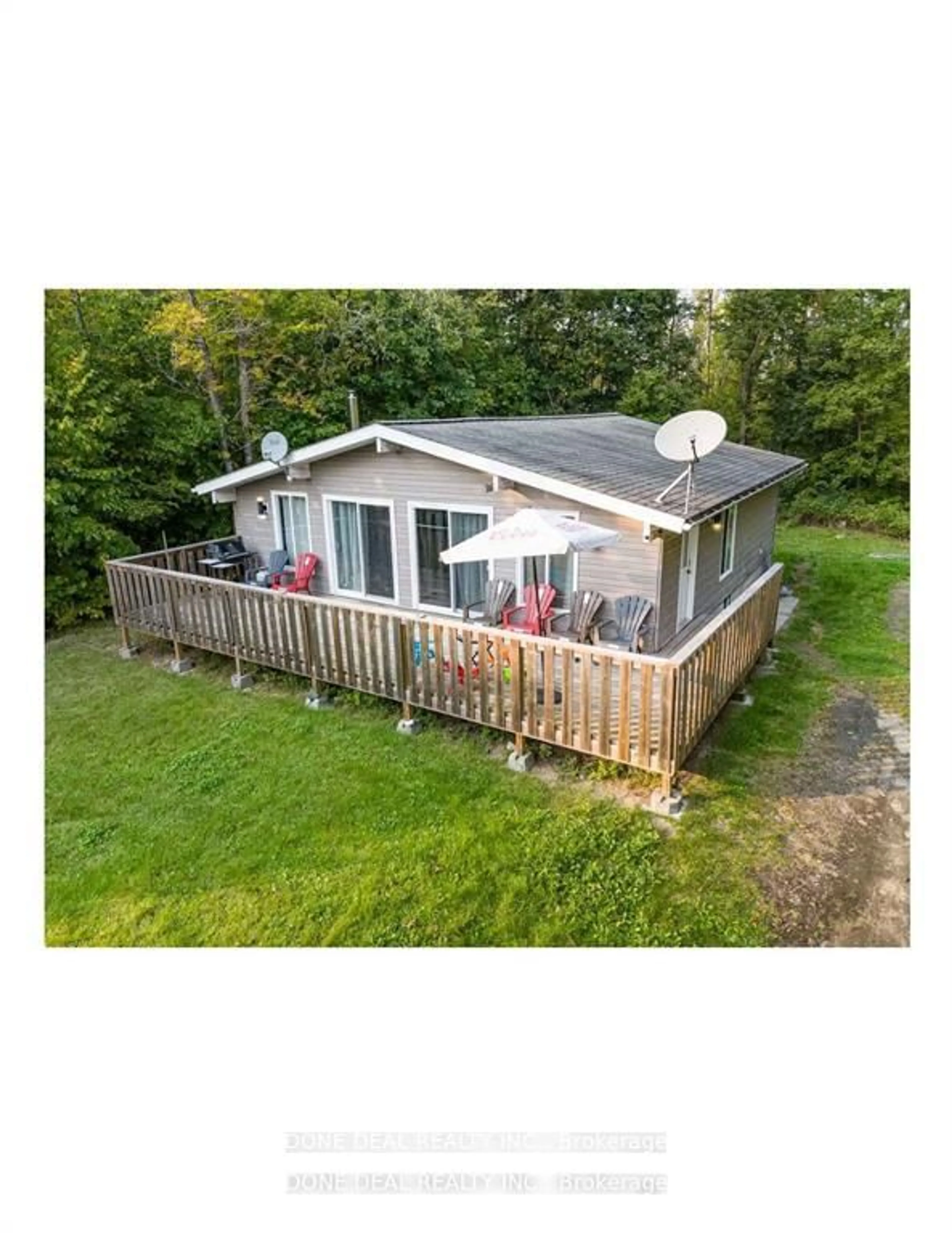 A pic from outside/outdoor area/front of a property/back of a property/a pic from drone, water/lake/river/ocean view for 179 Chapman Dr, Magnetawan Ontario P0A 1C0