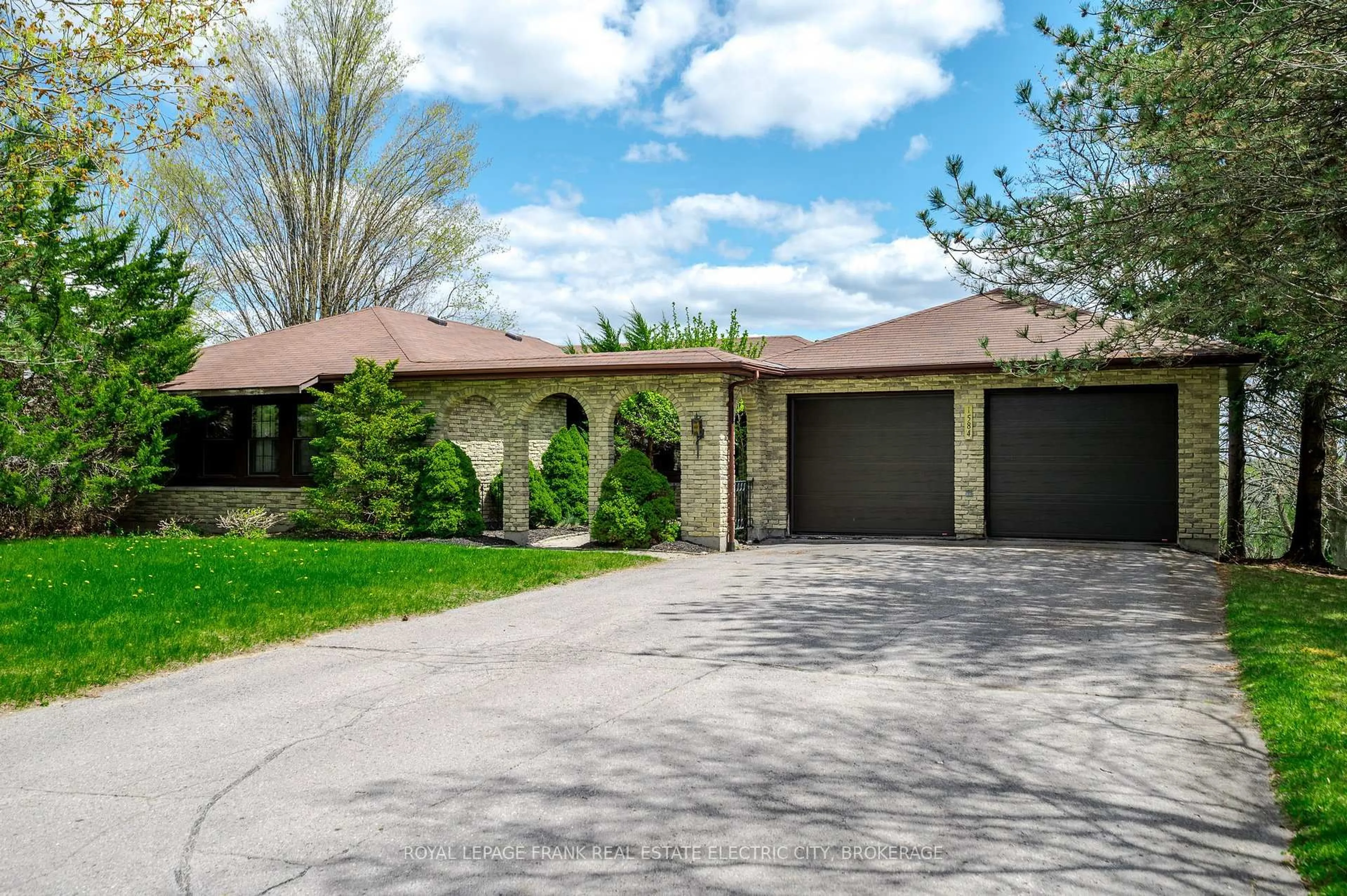 Home with brick exterior material, street for 1584 Champlain Dr, Peterborough Ontario K9L 1N6