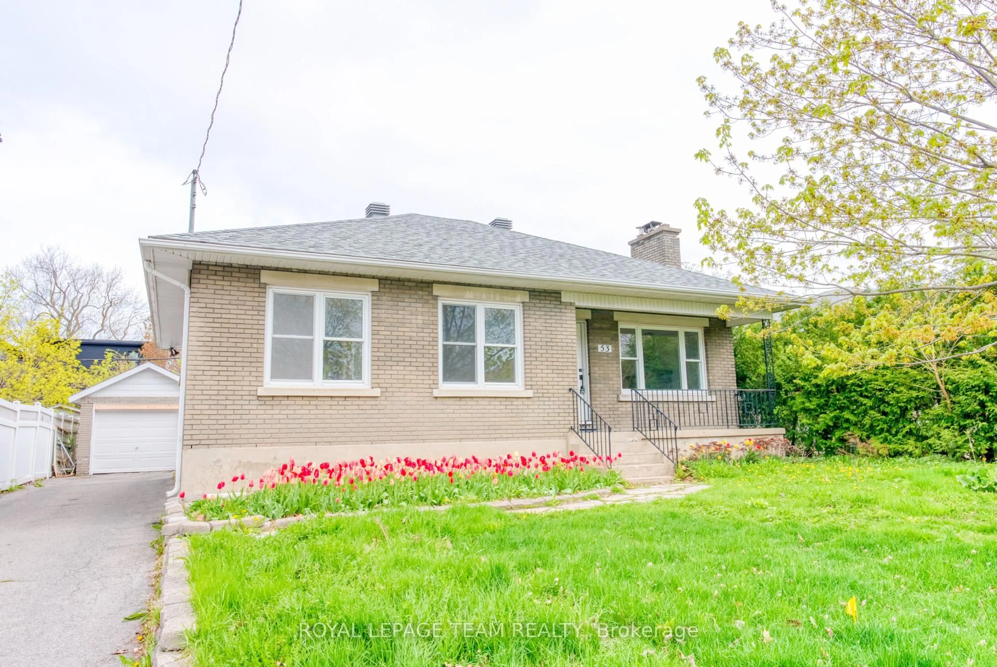 Home with brick exterior material, street for 53 Drouin Ave, Ottawa Ontario K1K 2A6