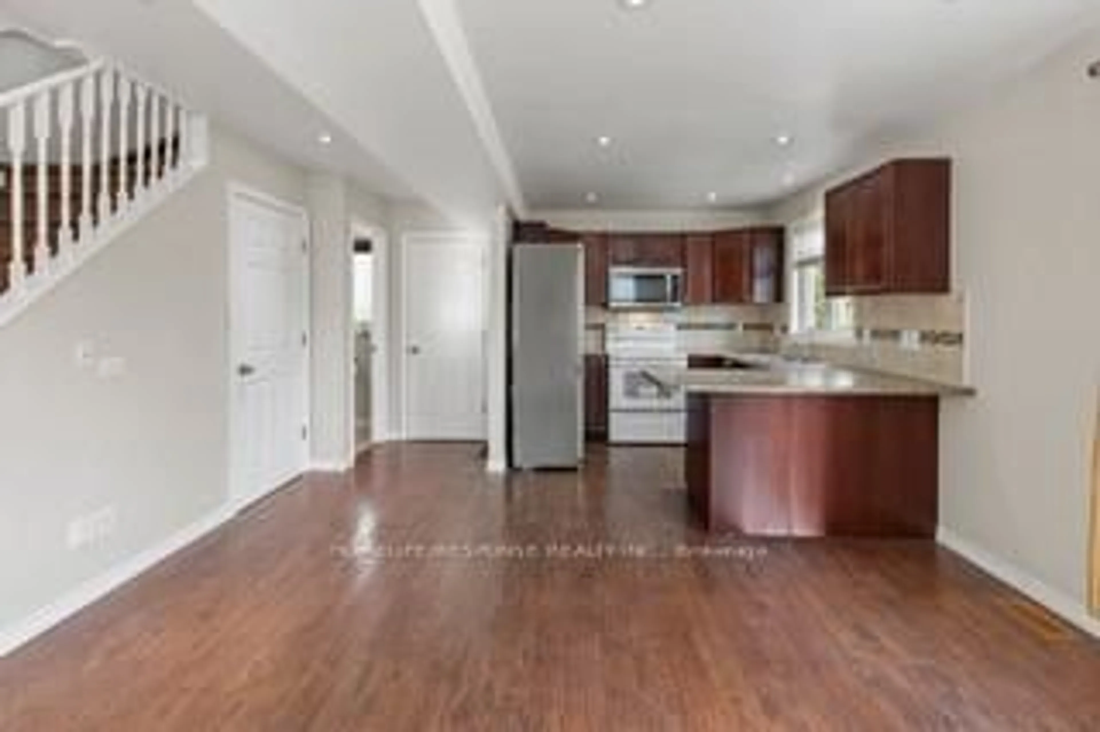 Open concept kitchen, wood/laminate floor for 5135 MORRISON St, Niagara Falls Ontario L2E 2E2