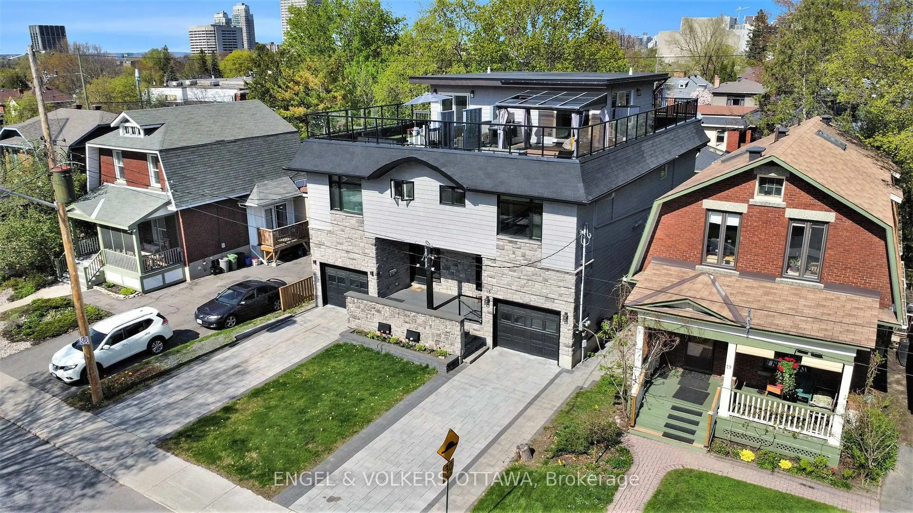 Home with brick exterior material, street for 15 Granville Ave, Ottawa Ontario K1Y 0M5