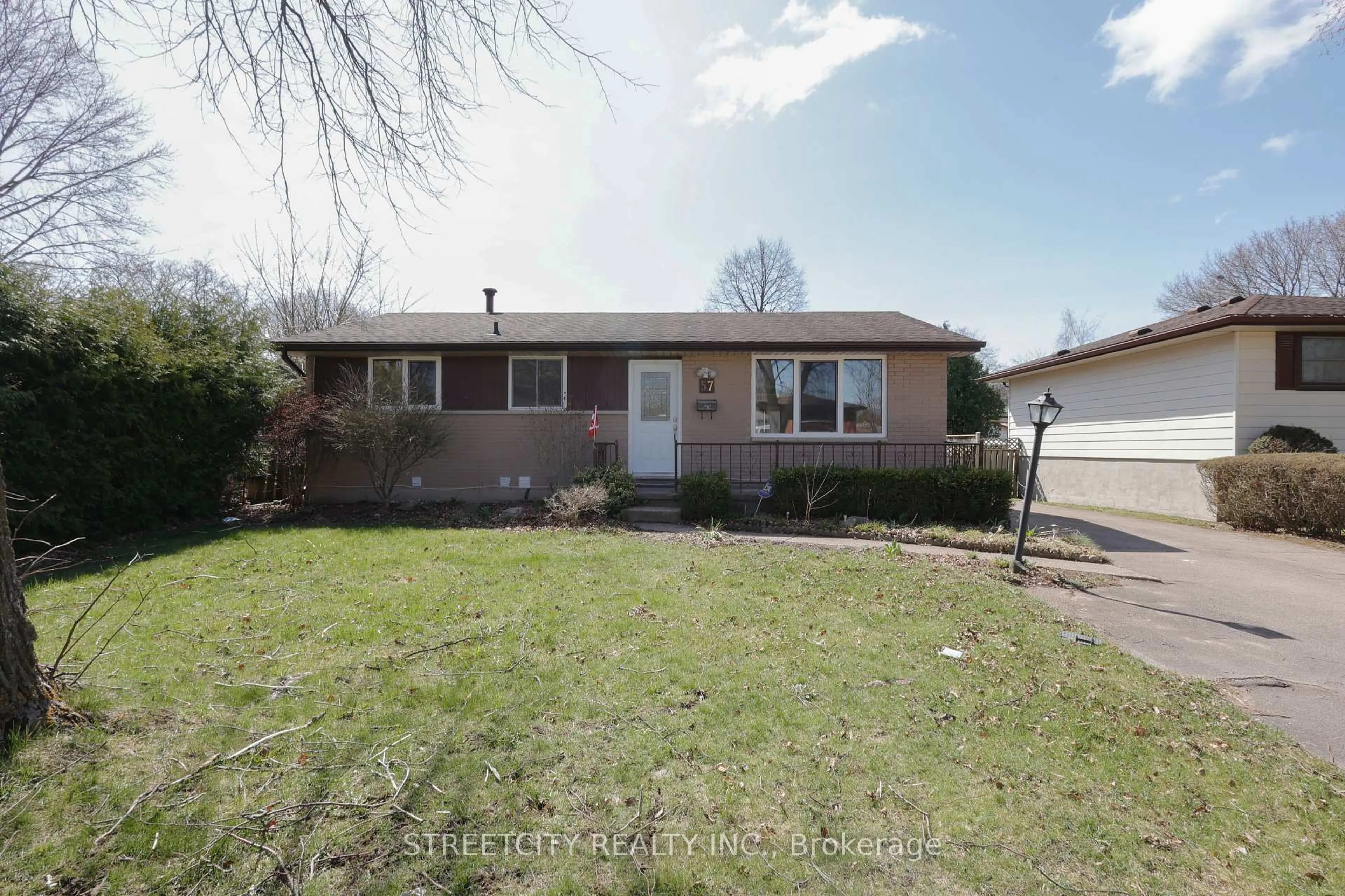 Home with vinyl exterior material, street for 57 Amy Cres, London East Ontario N5Y 4A5