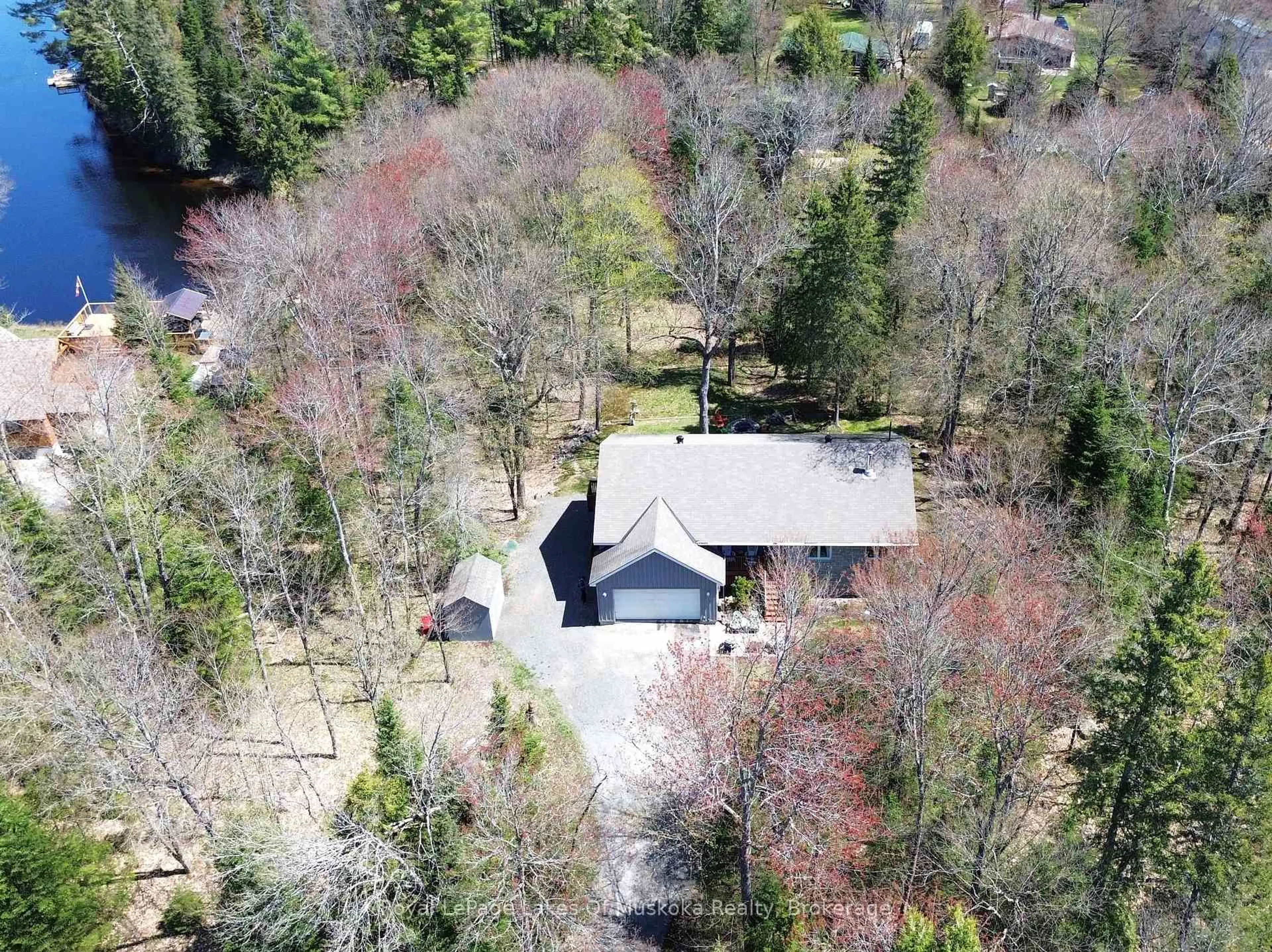 A pic from outside/outdoor area/front of a property/back of a property/a pic from drone, forest/trees view for 171 River Valley Dr, Huntsville Ontario P0B 1L0