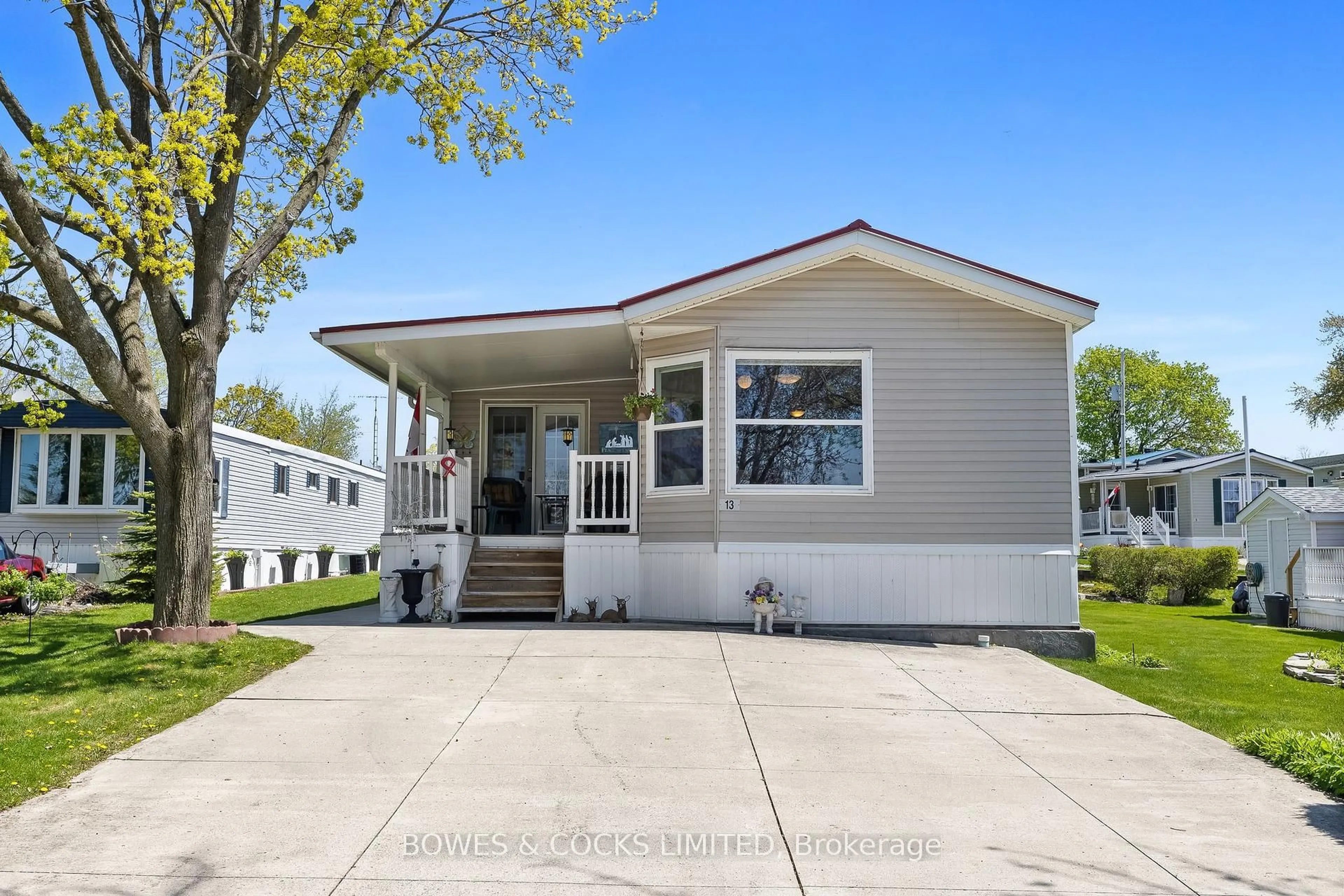 Home with vinyl exterior material, street for 13 McGregor Dr, Otonabee-South Monaghan Ontario K0L 2G0