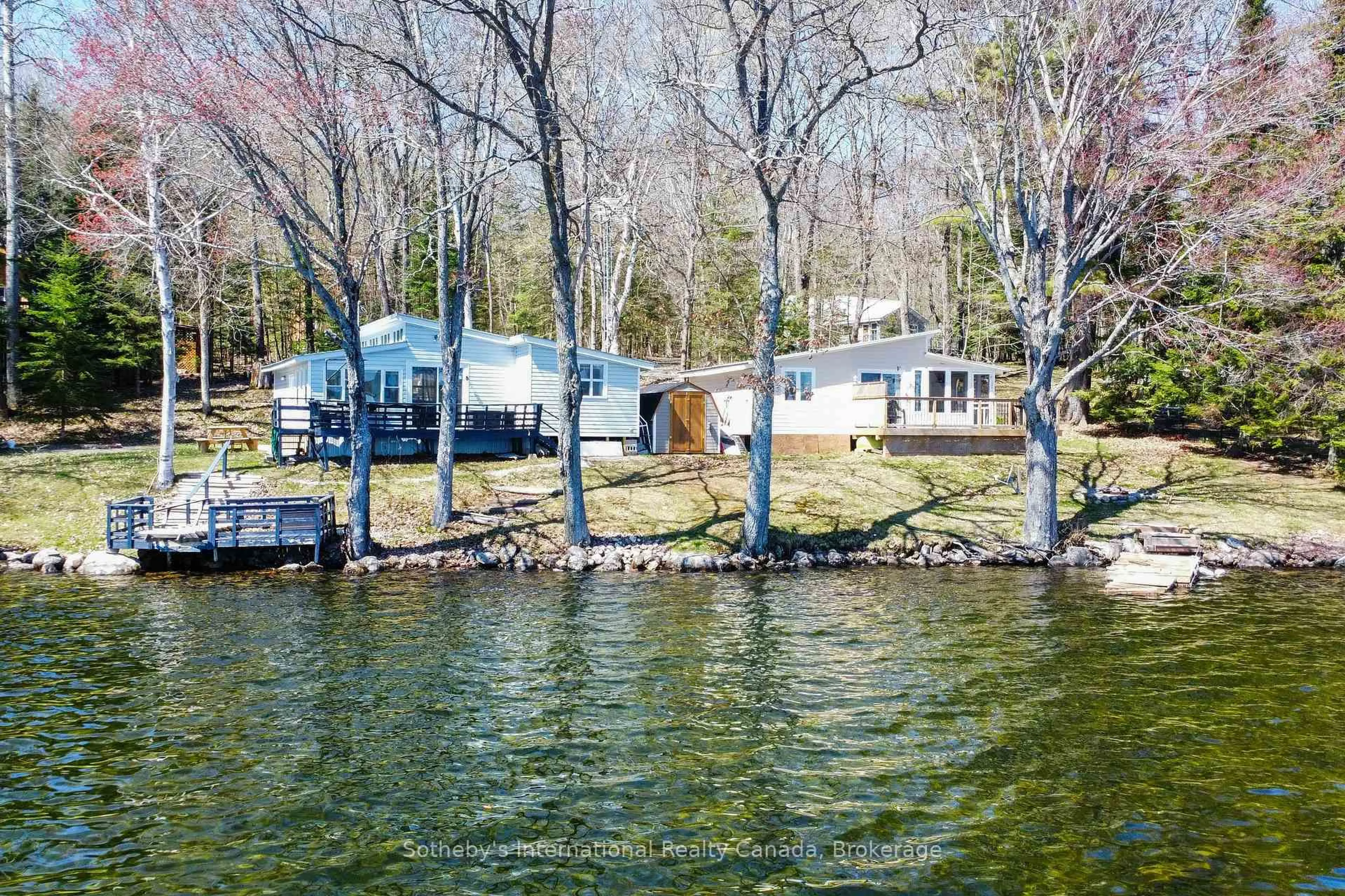 A pic from outside/outdoor area/front of a property/back of a property/a pic from drone, water/lake/river/ocean view for 1028 Hillcrest Lane, Algonquin Highlands Ontario K0M 1S0