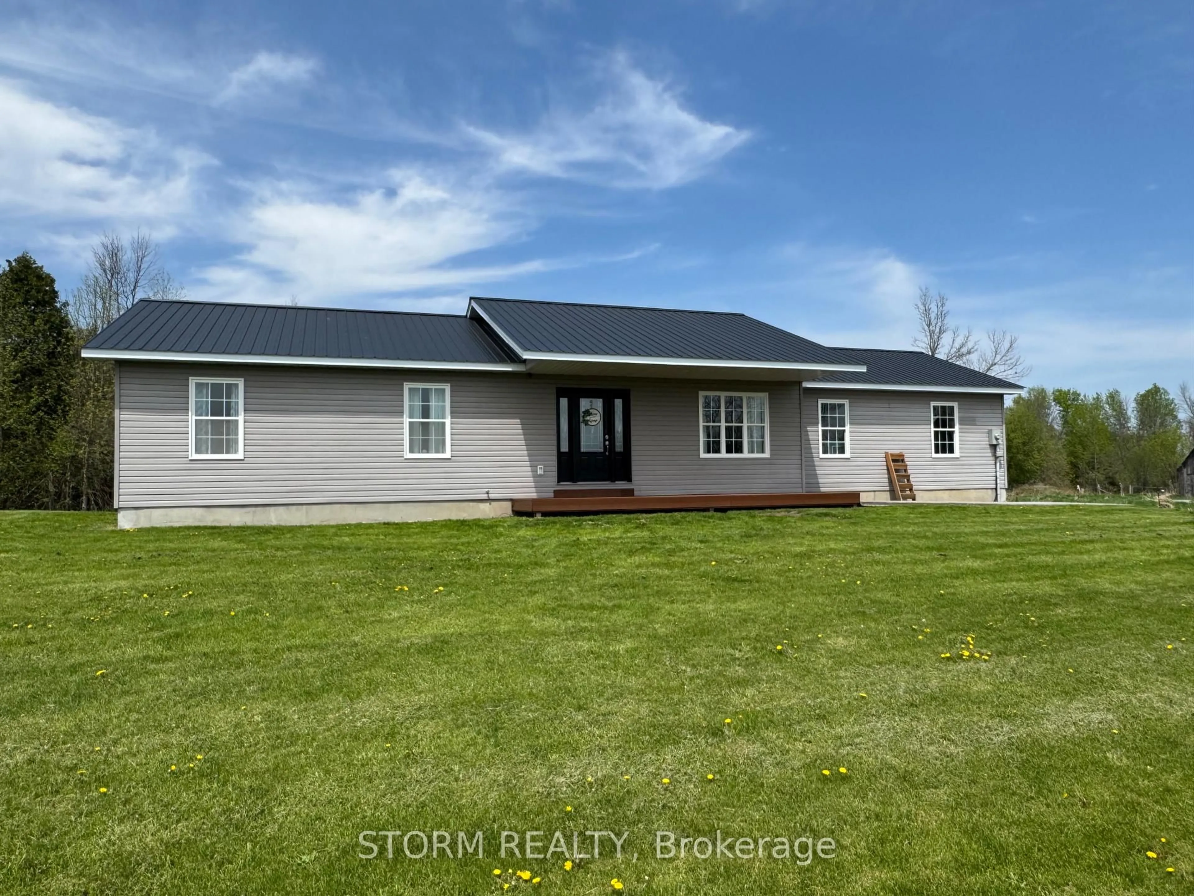 A pic from outside/outdoor area/front of a property/back of a property/a pic from drone, street for 14211 Dafoe Rd, South Stormont Ontario K0C 1M0