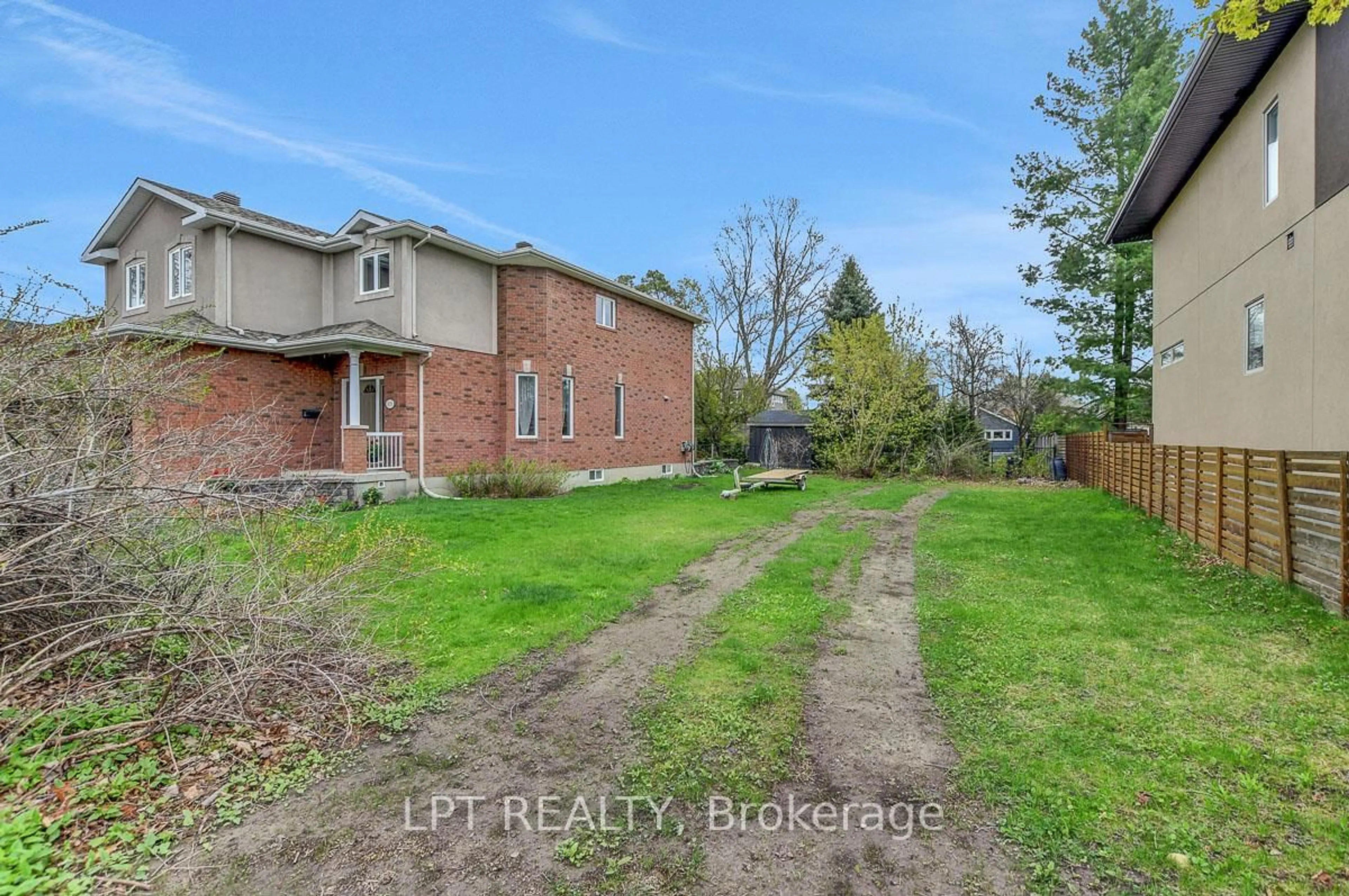A pic from outside/outdoor area/front of a property/back of a property/a pic from drone, water/lake/river/ocean view for 10B Ashburn Dr, Ottawa Ontario K2E 6N3