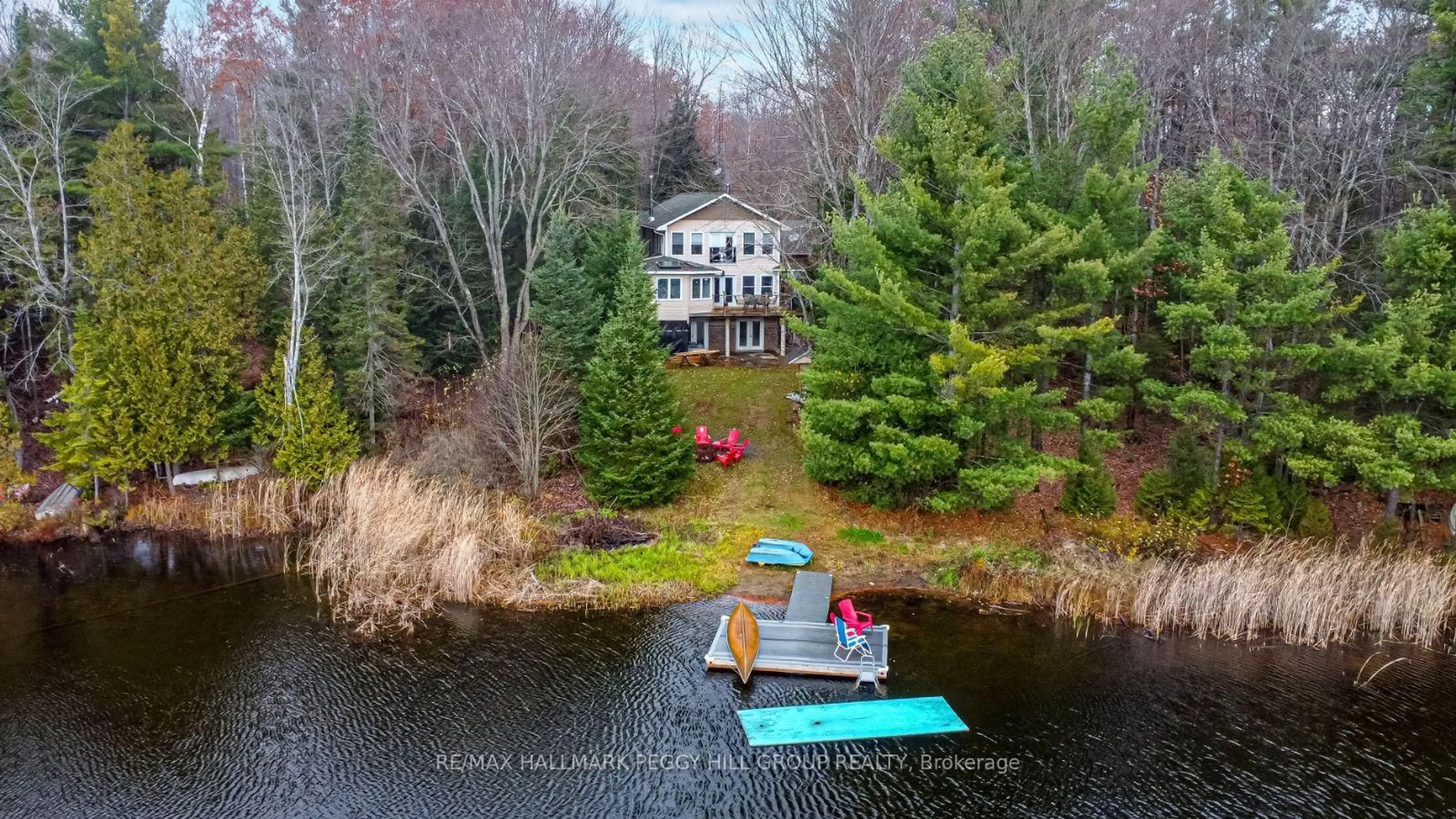 A pic from outside/outdoor area/front of a property/back of a property/a pic from drone, water/lake/river/ocean view for 4 Clover Crt, Kawartha Lakes Ontario K0M 2A0