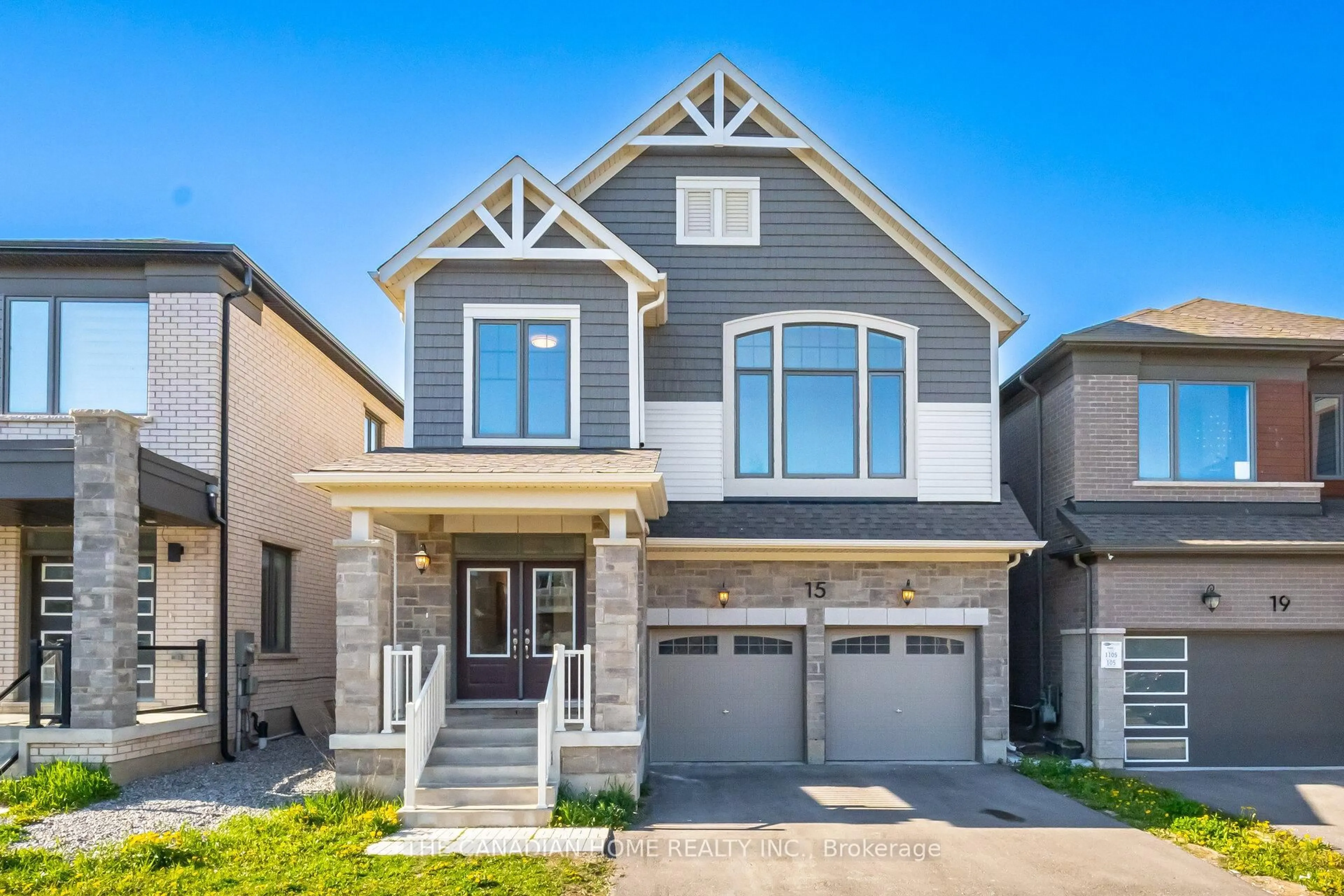 Home with brick exterior material, street for 15 William Nador St, Kitchener Ontario N2R 0S3