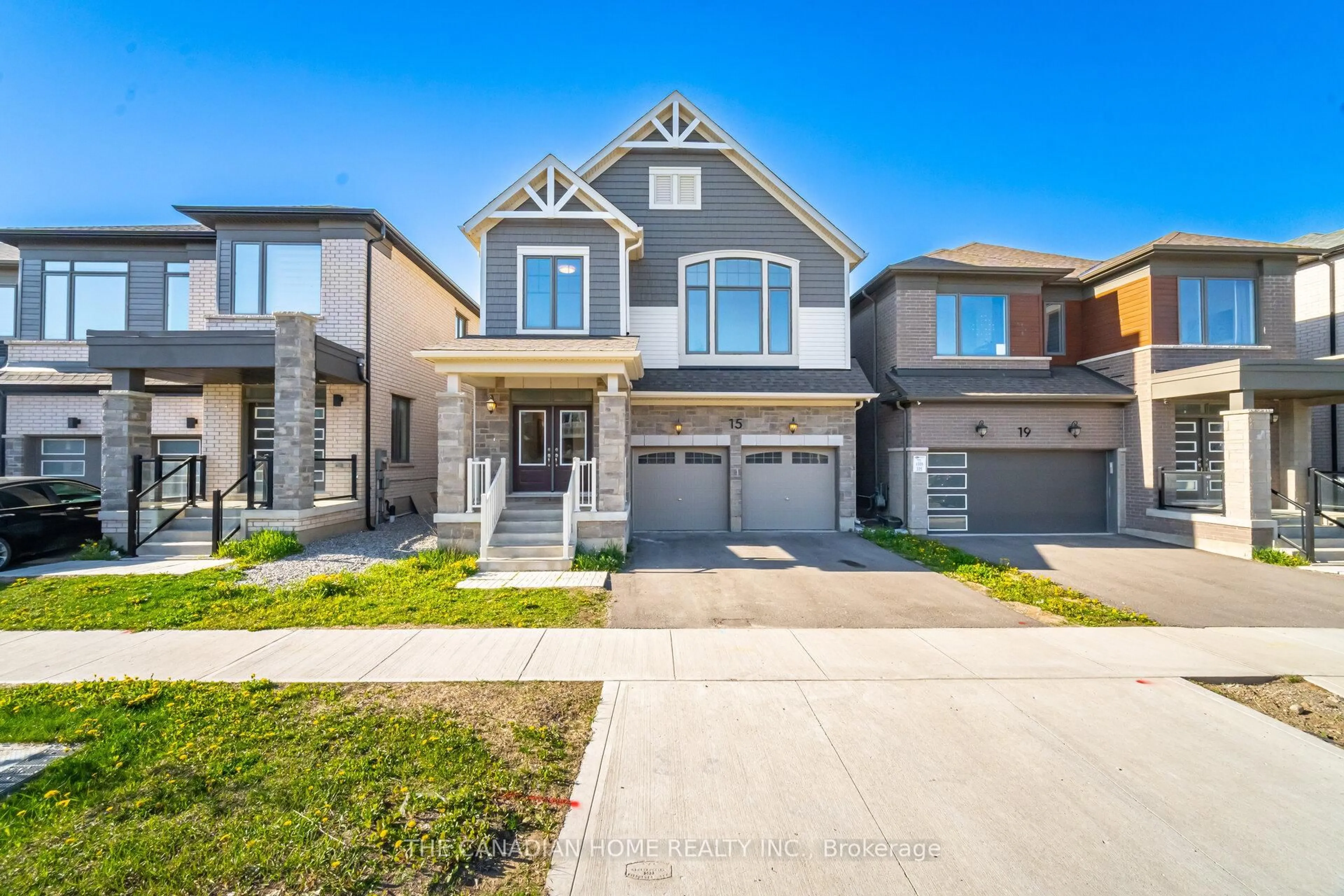 Home with brick exterior material, street for 15 William Nador St, Kitchener Ontario N2R 0S3
