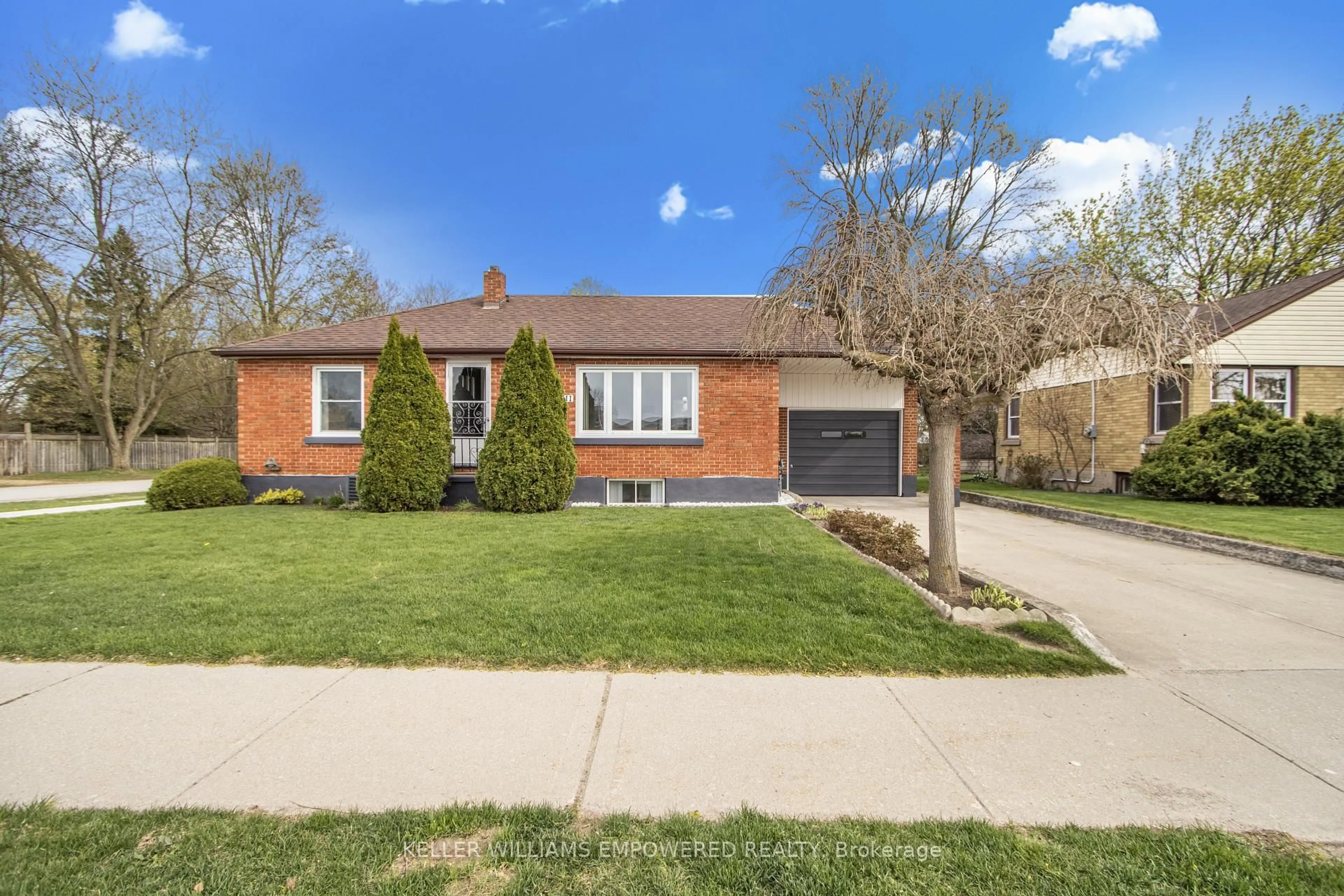 Home with brick exterior material, street for 711 Bowan St, Strathroy-Caradoc Ontario N0L 1W0