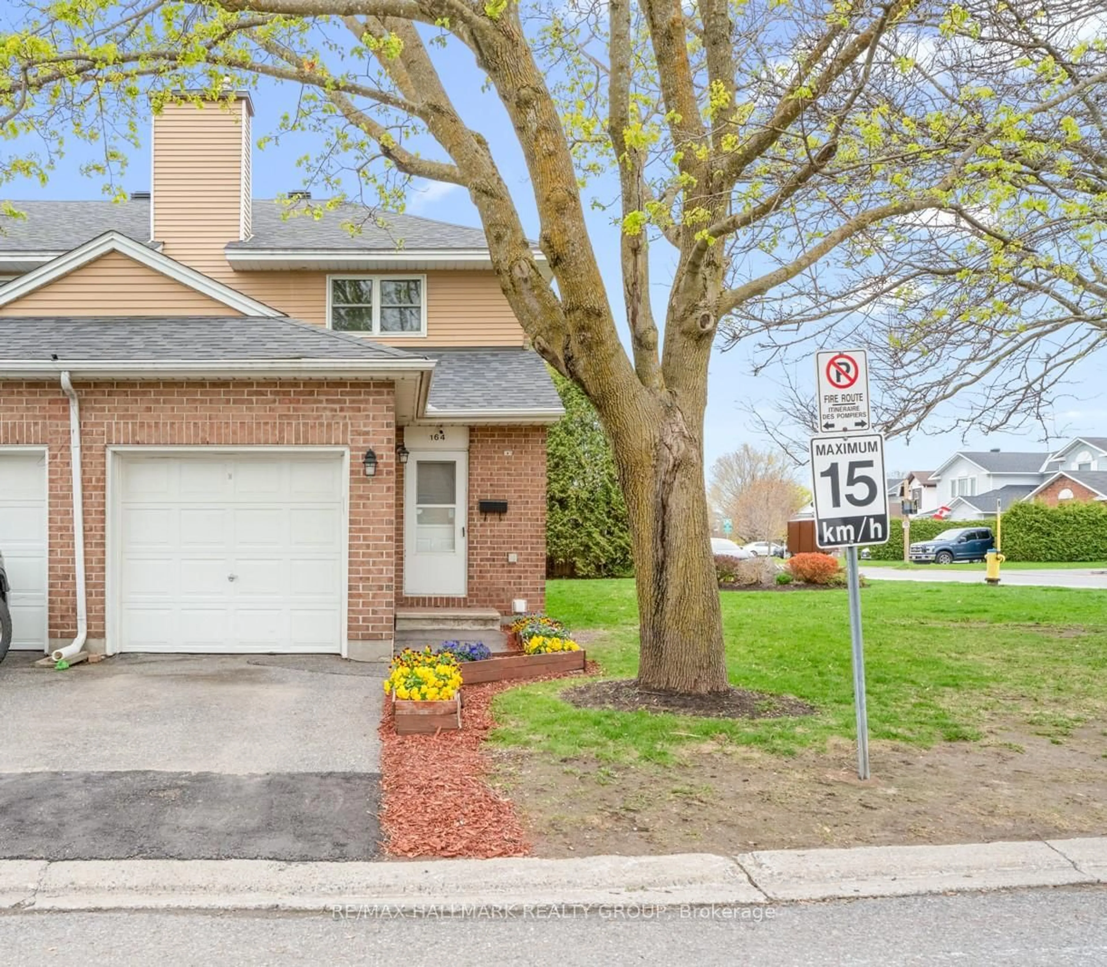 Home with brick exterior material, street for 164 Bentbrook Cres #1, Ottawa Ontario K2J 3Y3