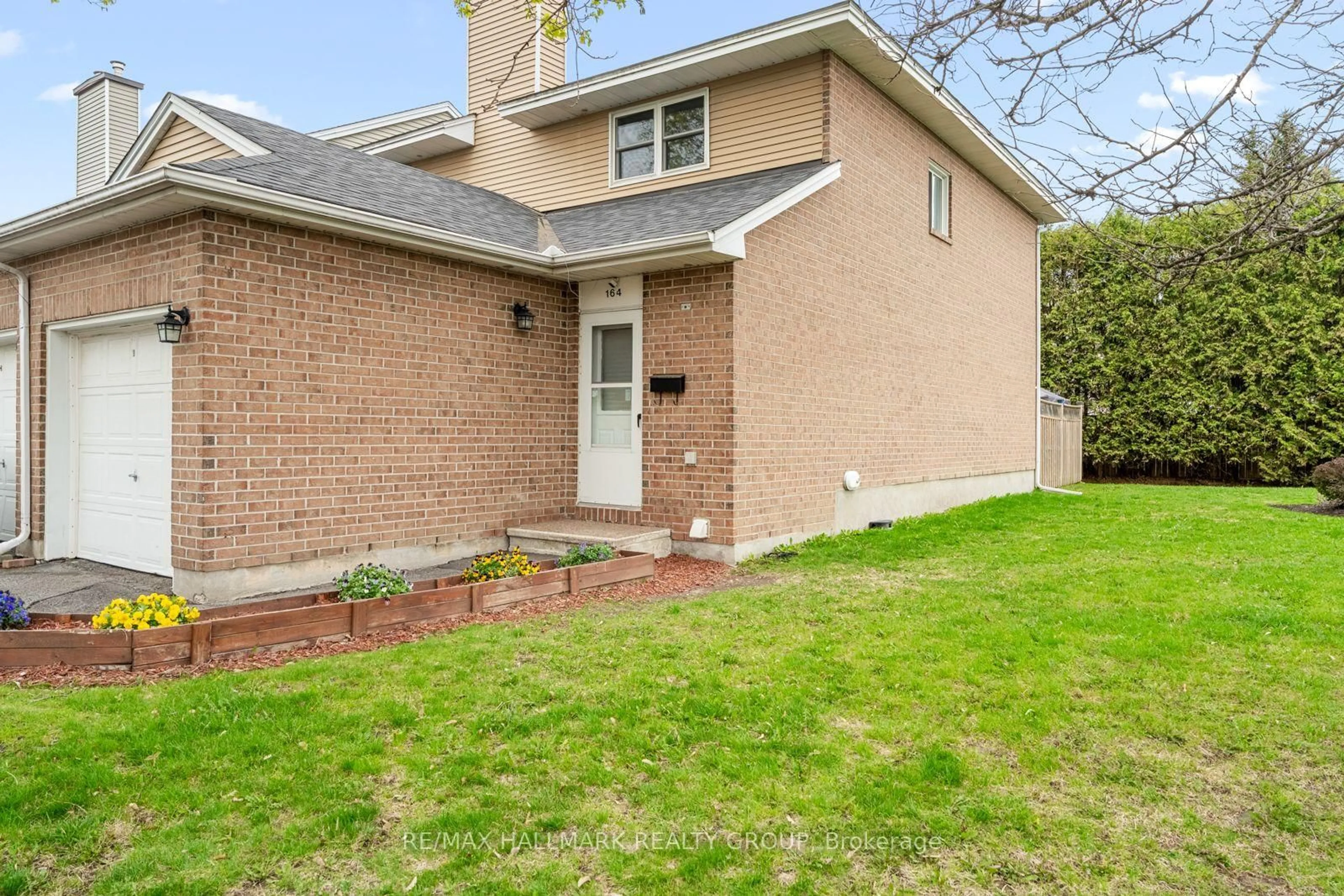 Home with brick exterior material, street for 164 Bentbrook Cres #1, Ottawa Ontario K2J 3Y3
