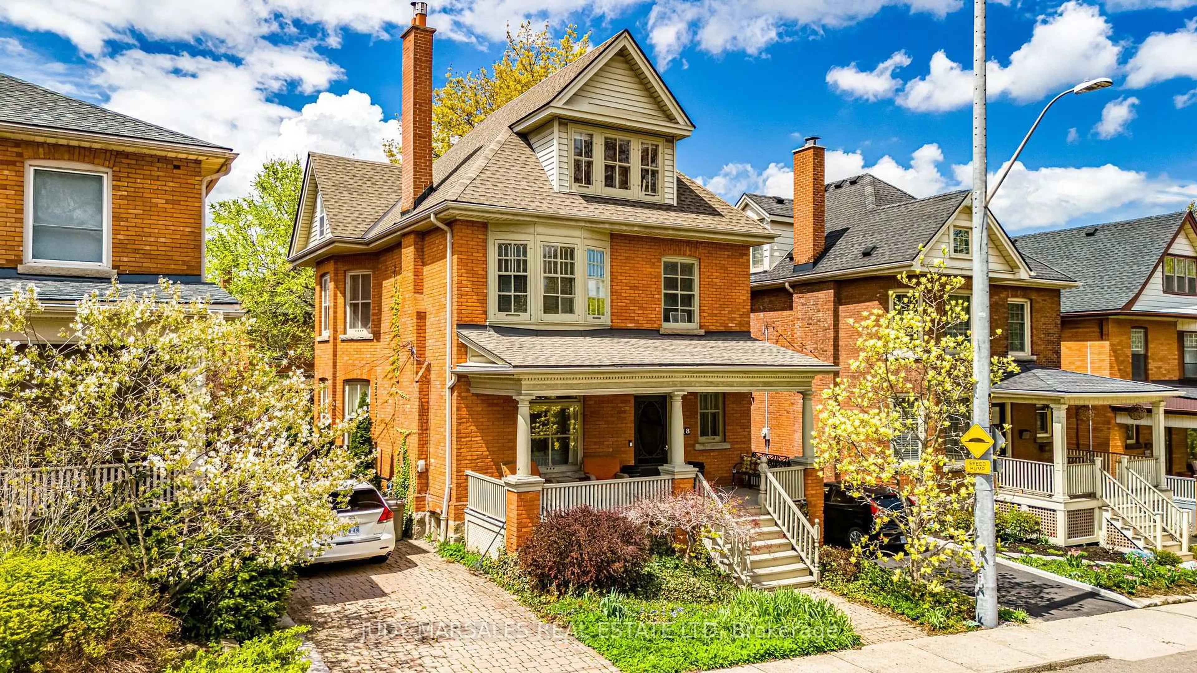 Home with brick exterior material, street for 18 Spruceside Ave, Hamilton Ontario L8P 3Y3