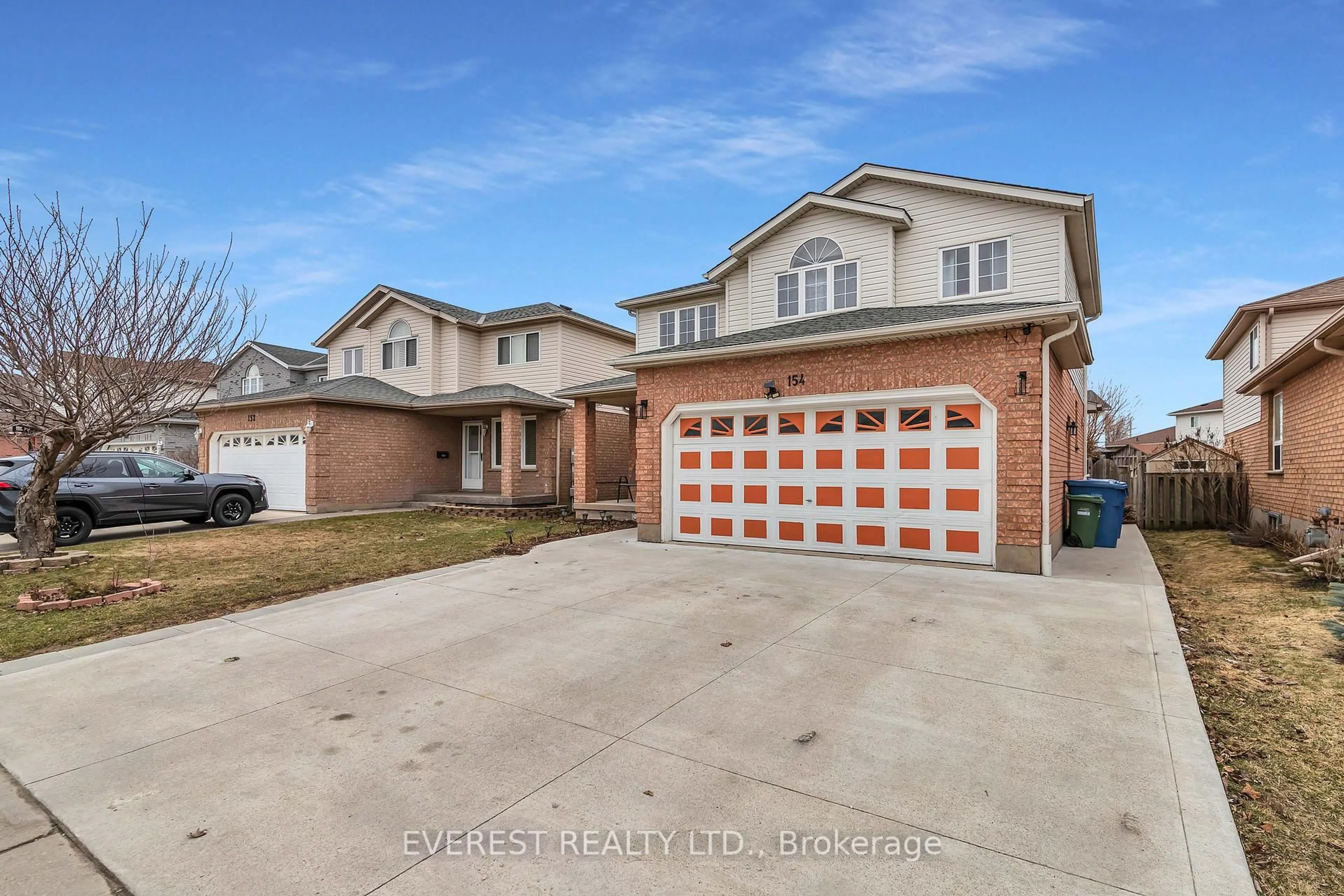 Home with brick exterior material, street for 154 deerpath Dr, Guelph Ontario N1K 1W9