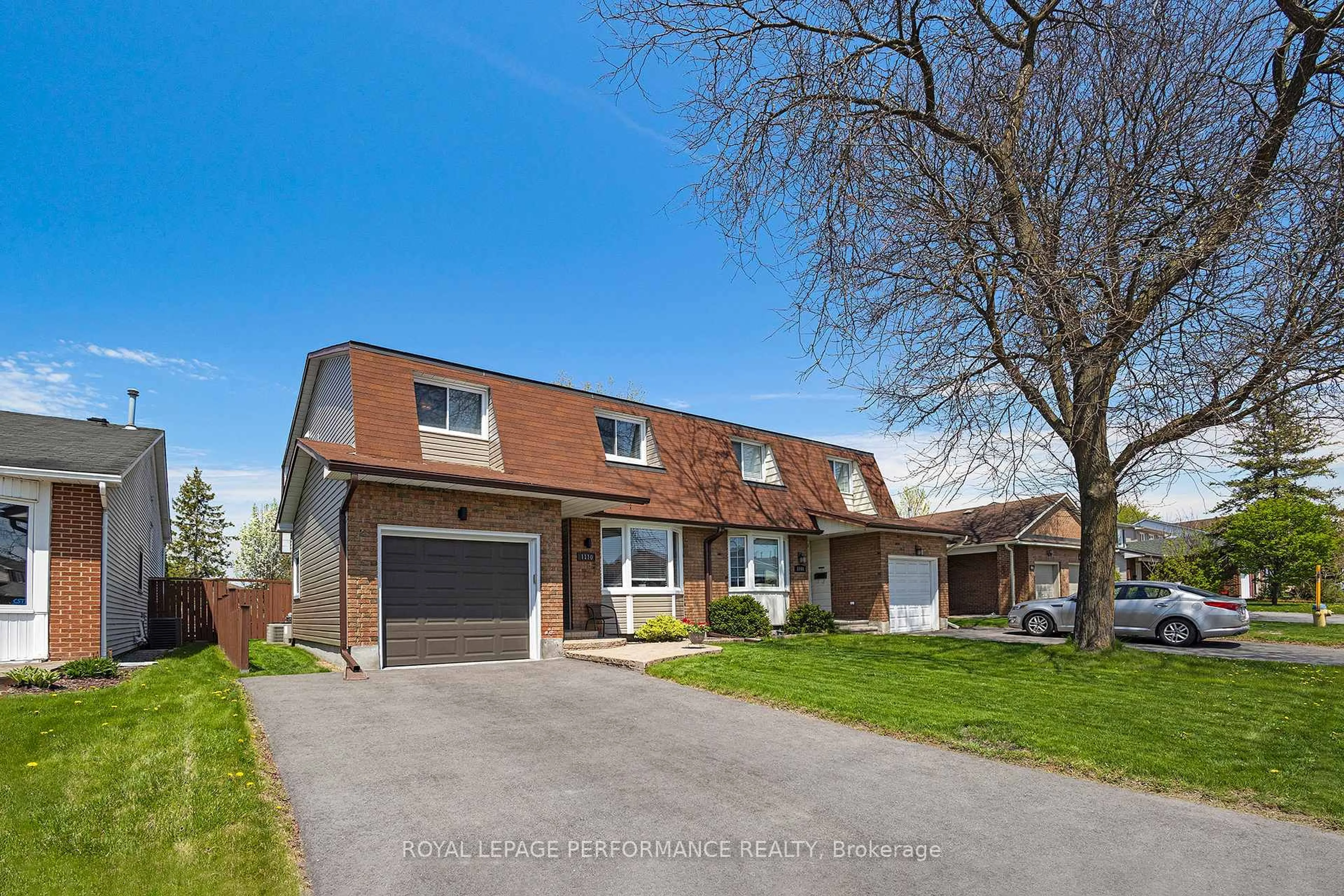 Home with brick exterior material, street for 1110 Burgundy Lane, Ottawa Ontario K1C 2M8