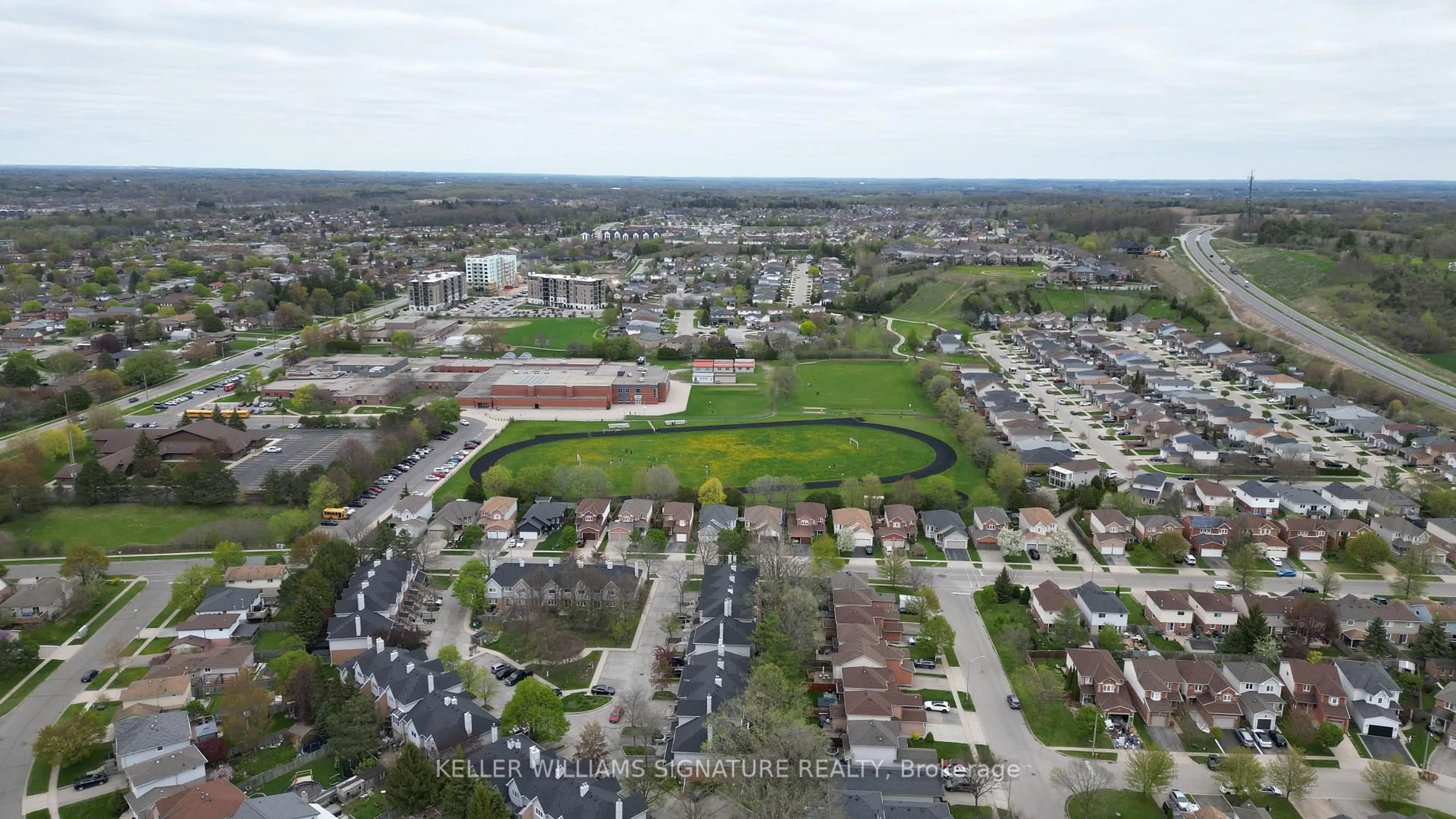 A pic from outside/outdoor area/front of a property/back of a property/a pic from drone, street for 203 Langlaw Dr, Cambridge Ontario N1P 1E8