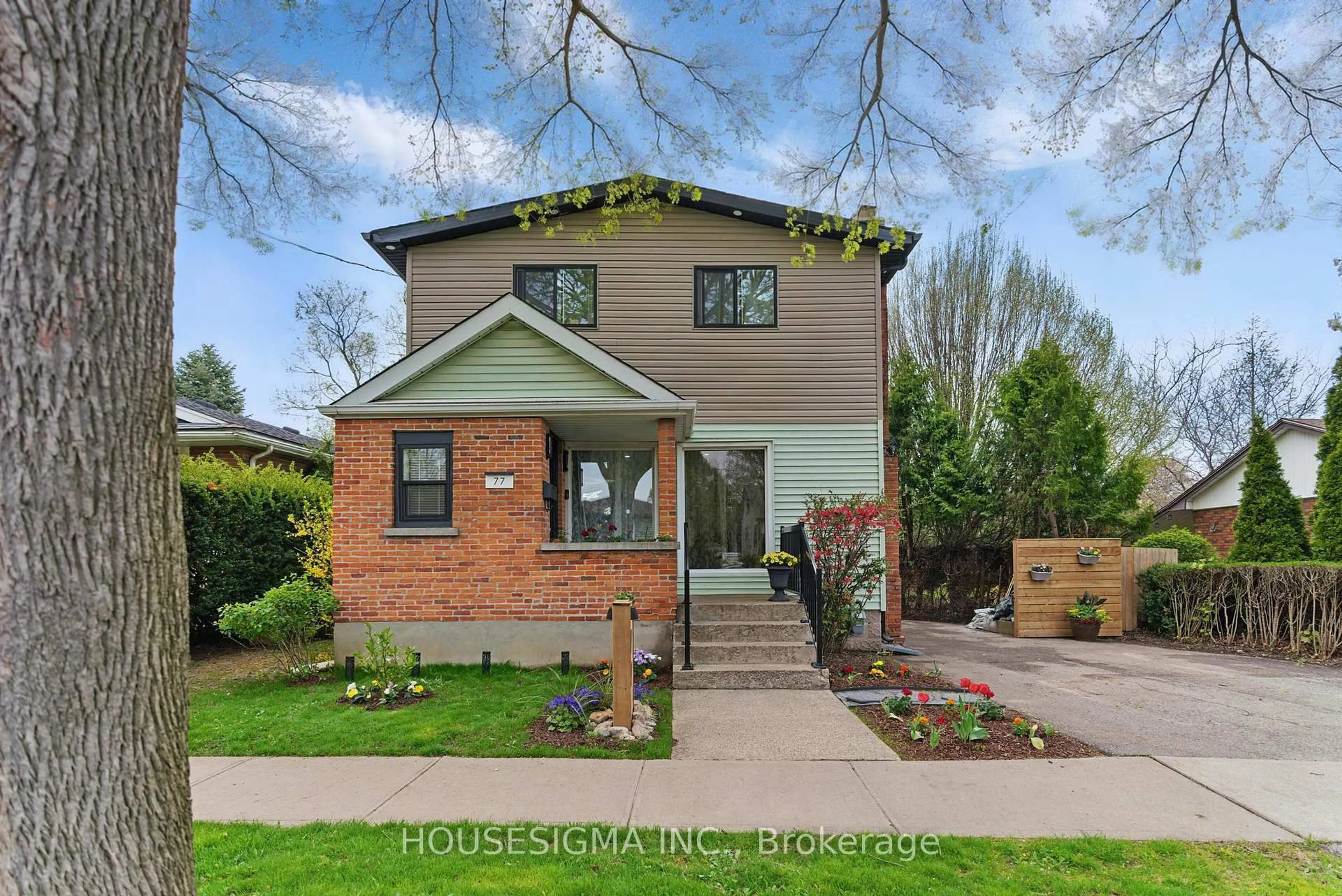 Home with brick exterior material, street for 77 Mildred Ave, St. Catharines Ontario L2R 6J4