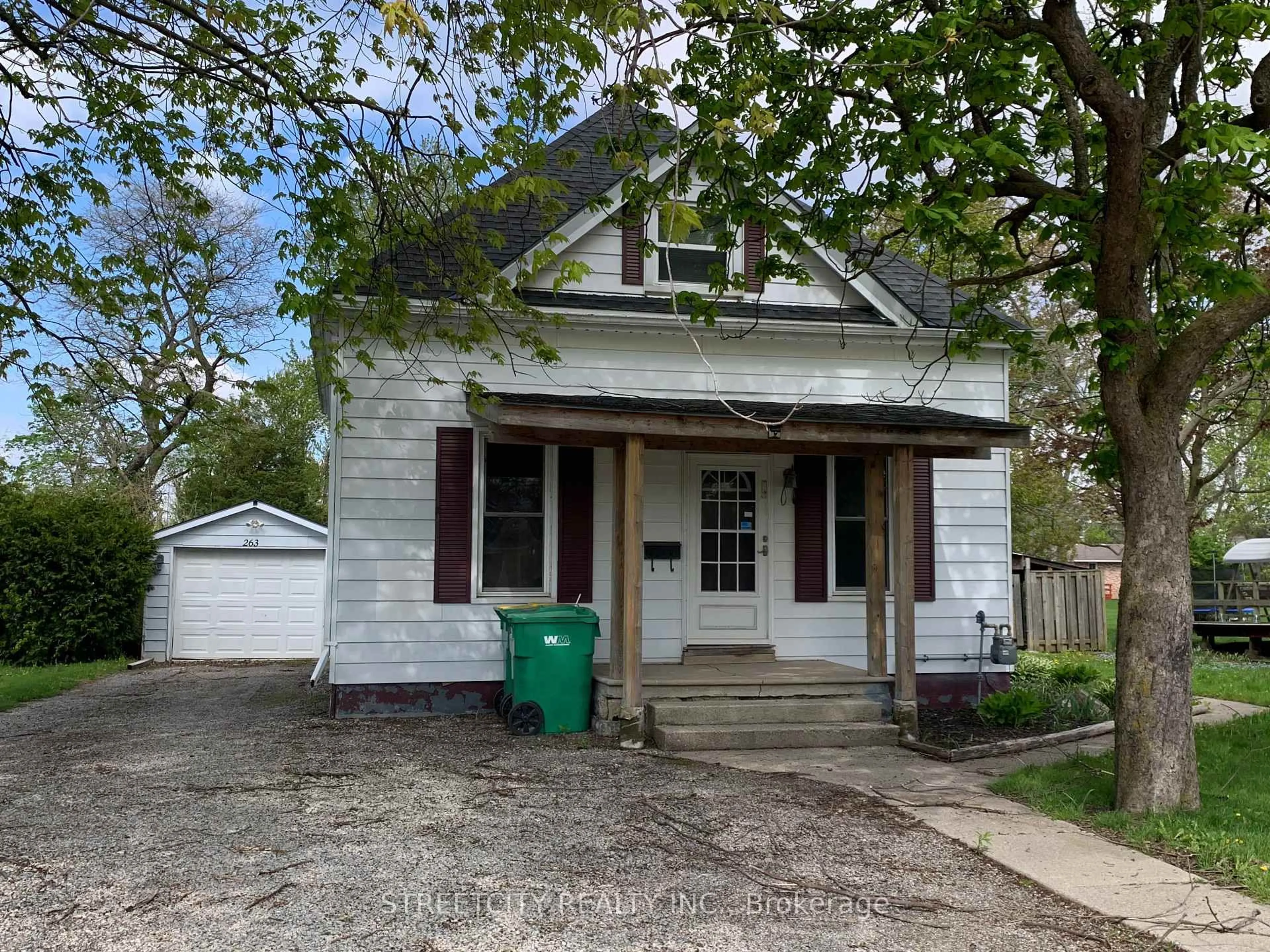 A pic from outside/outdoor area/front of a property/back of a property/a pic from drone, street for 263 King St, Southwest Middlesex Ontario N0L 1M0
