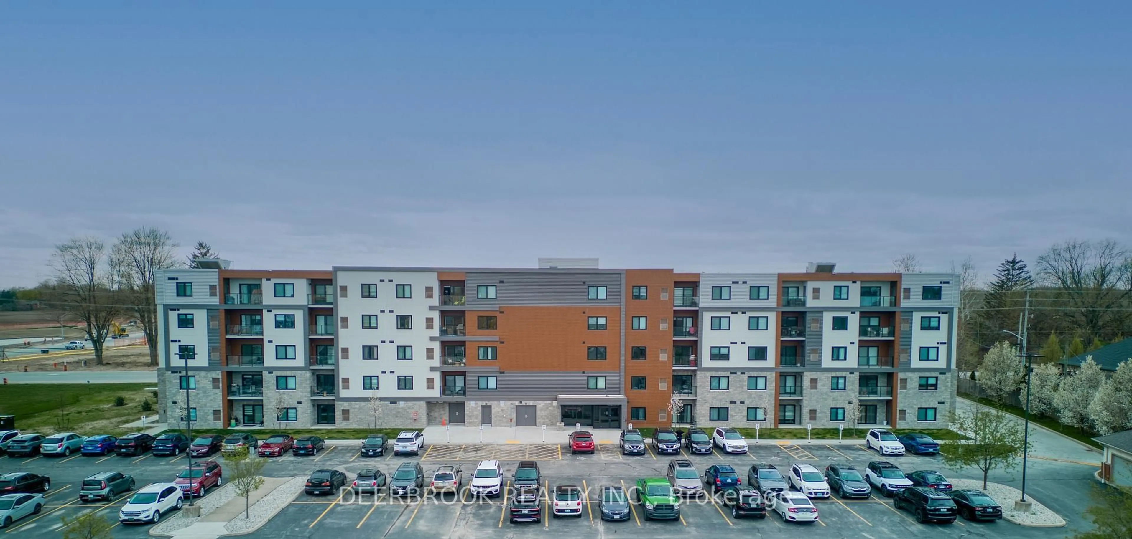 A pic from outside/outdoor area/front of a property/back of a property/a pic from drone, unknown for 4578 Huron Church Line Rd #313, LaSalle Ontario N9H 0M2