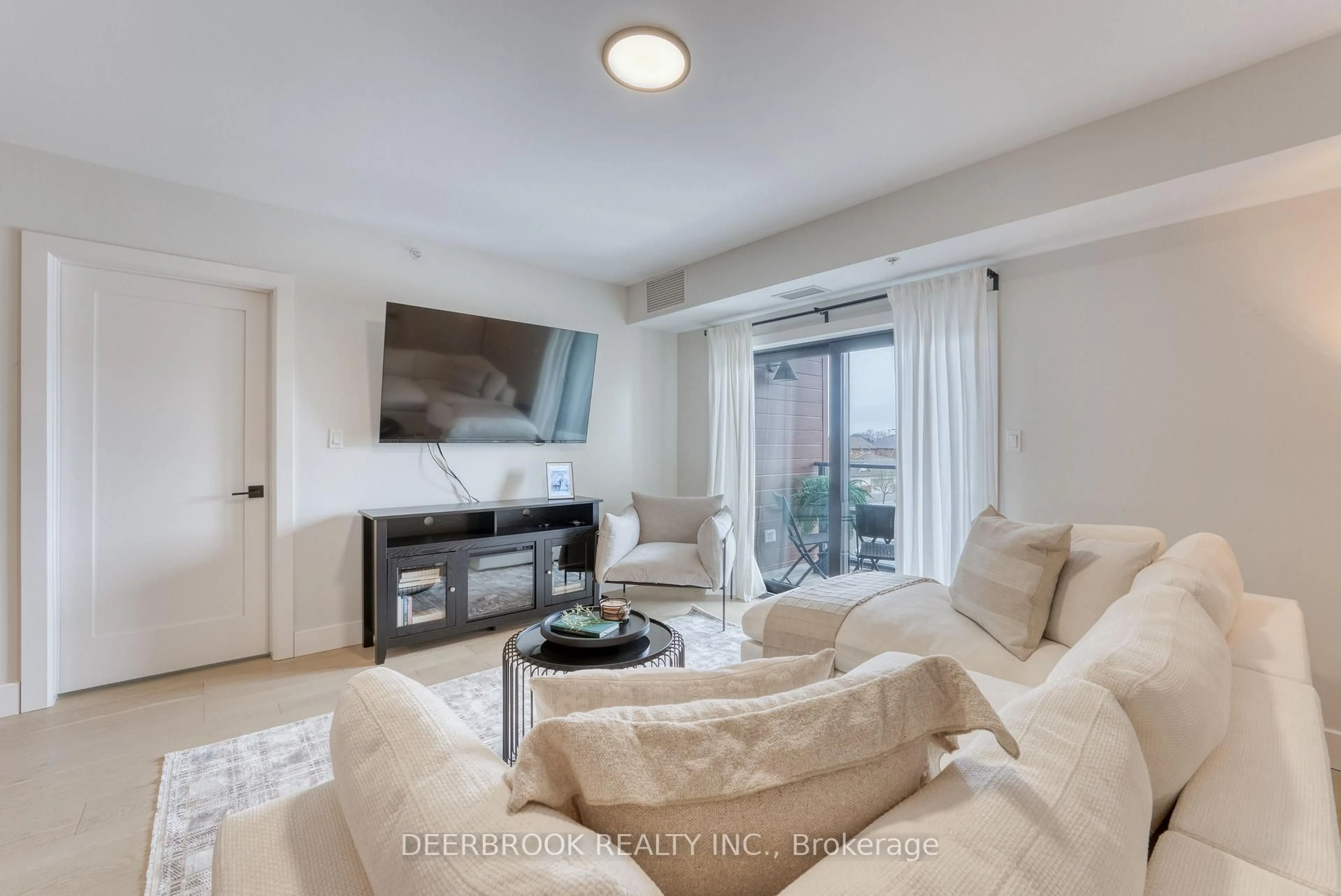 Living room with furniture, unknown for 4578 Huron Church Line Rd #313, LaSalle Ontario N9H 0M2