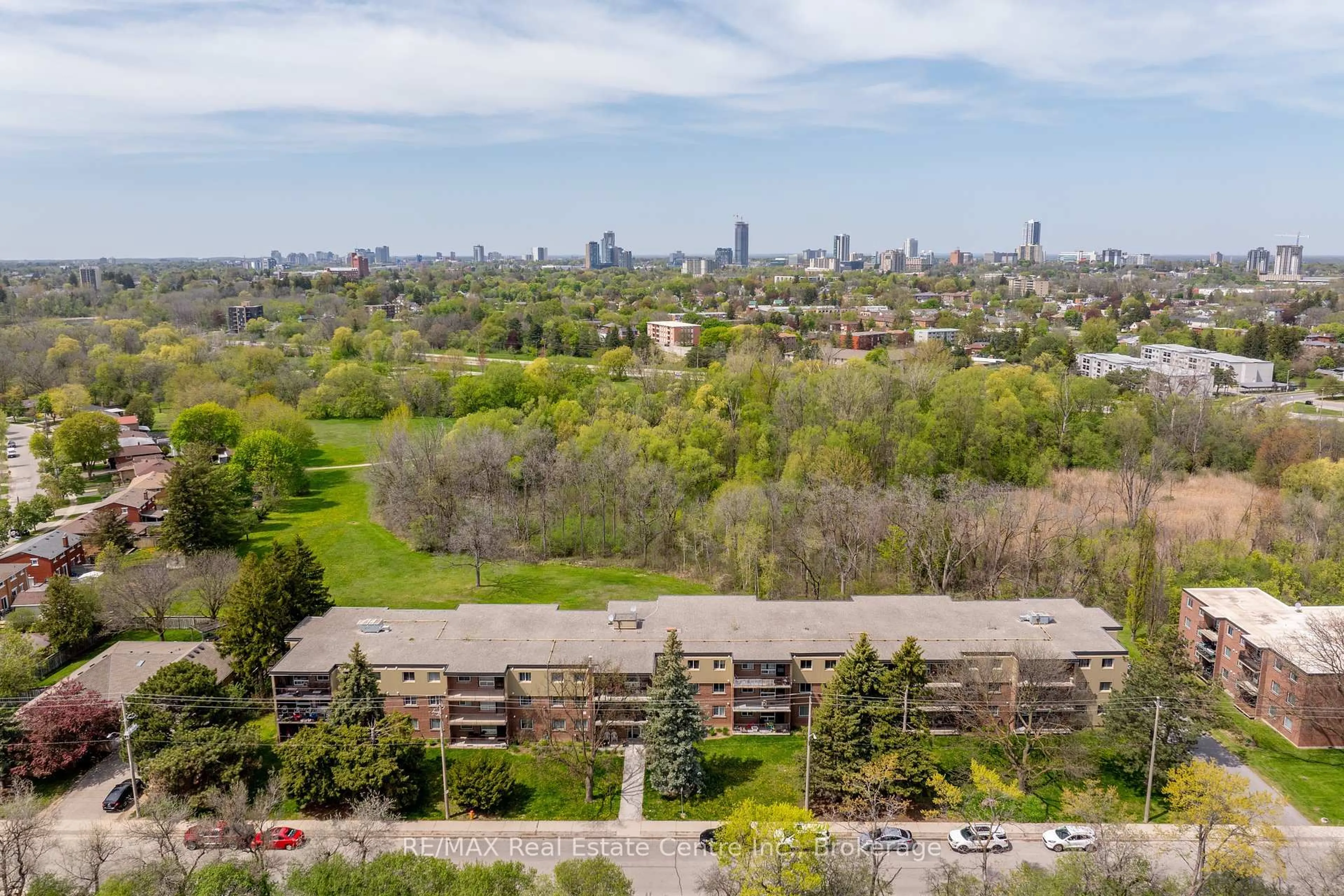 A pic from outside/outdoor area/front of a property/back of a property/a pic from drone, city buildings view from balcony for 30 Avalon Pl #307, Kitchener Ontario N2M 4N6