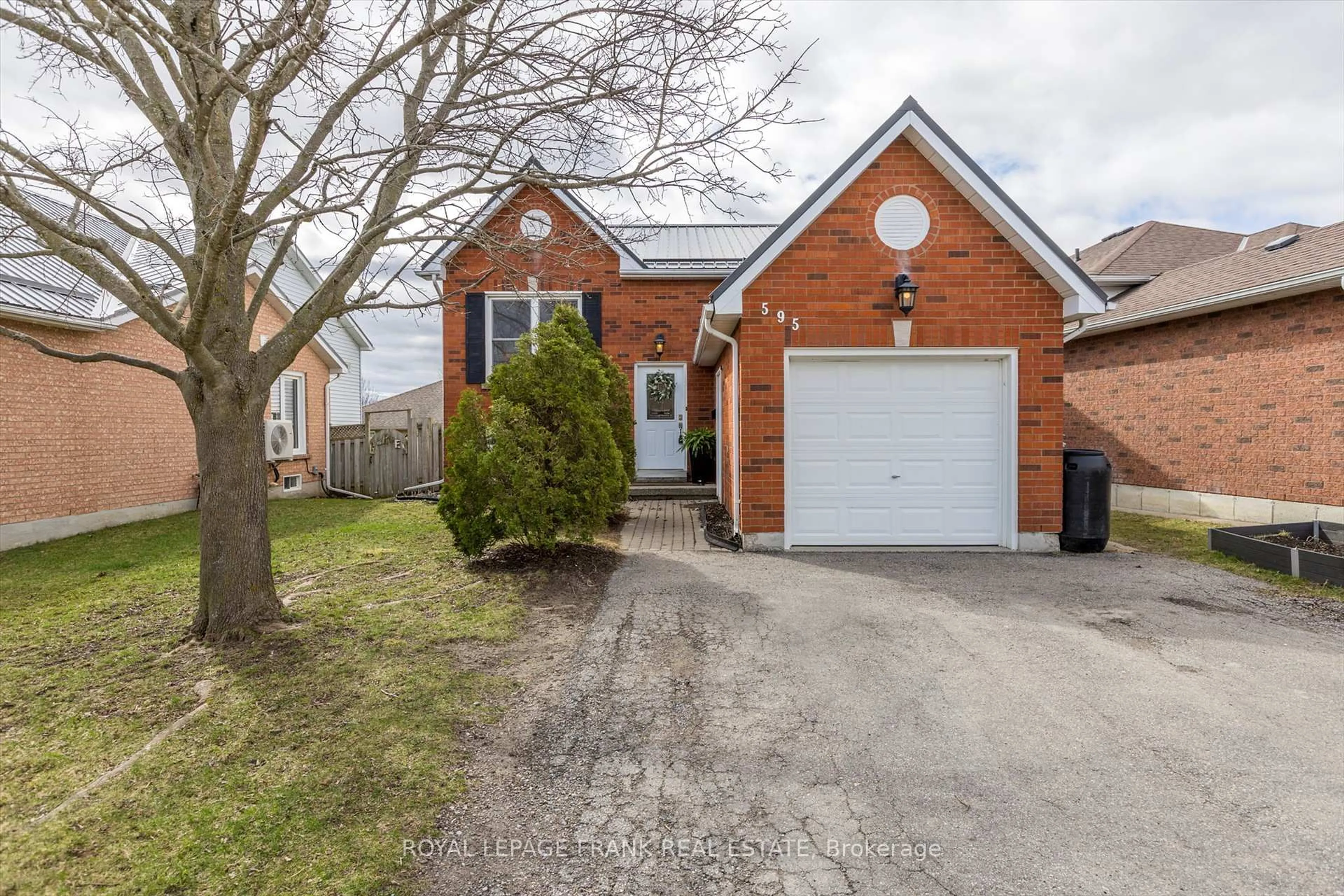 Home with brick exterior material, street for 595 Westman Ave, Peterborough West Ontario K9K 2H3
