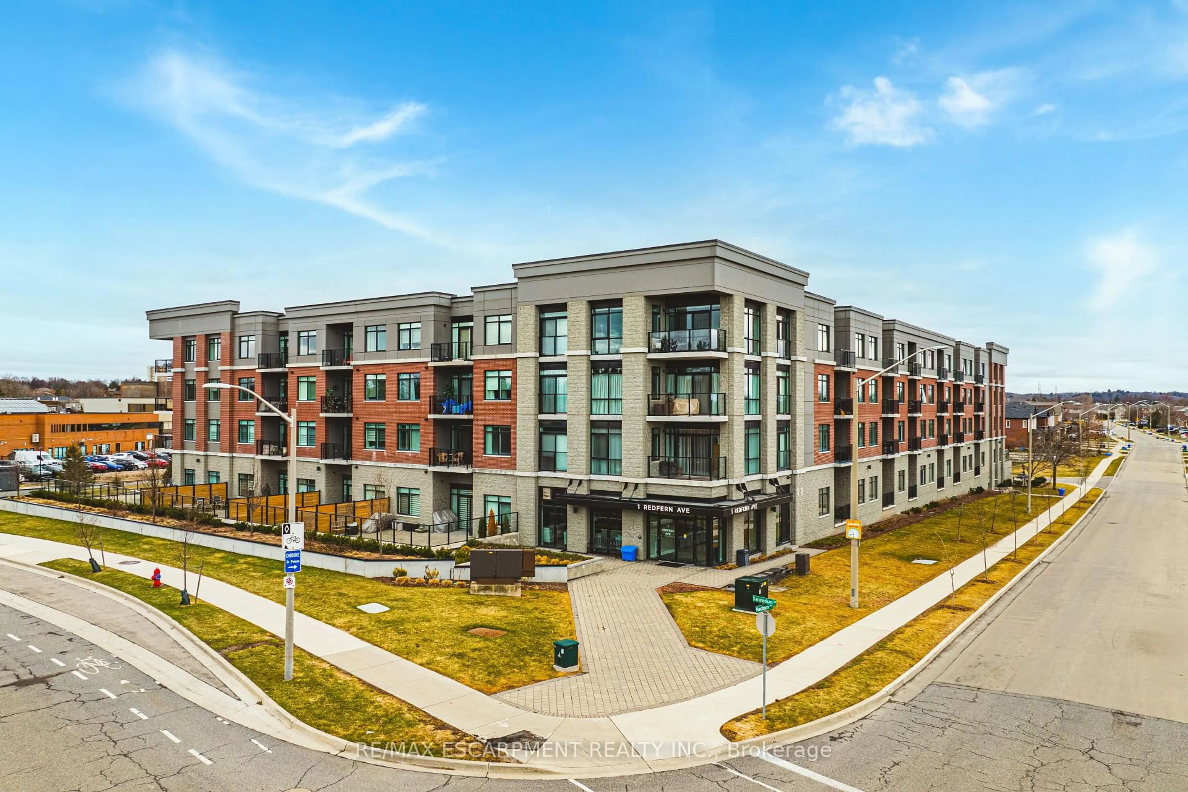 A pic from outside/outdoor area/front of a property/back of a property/a pic from drone, building for 1 Redfern Ave #215, Hamilton Ontario L9C 0E6