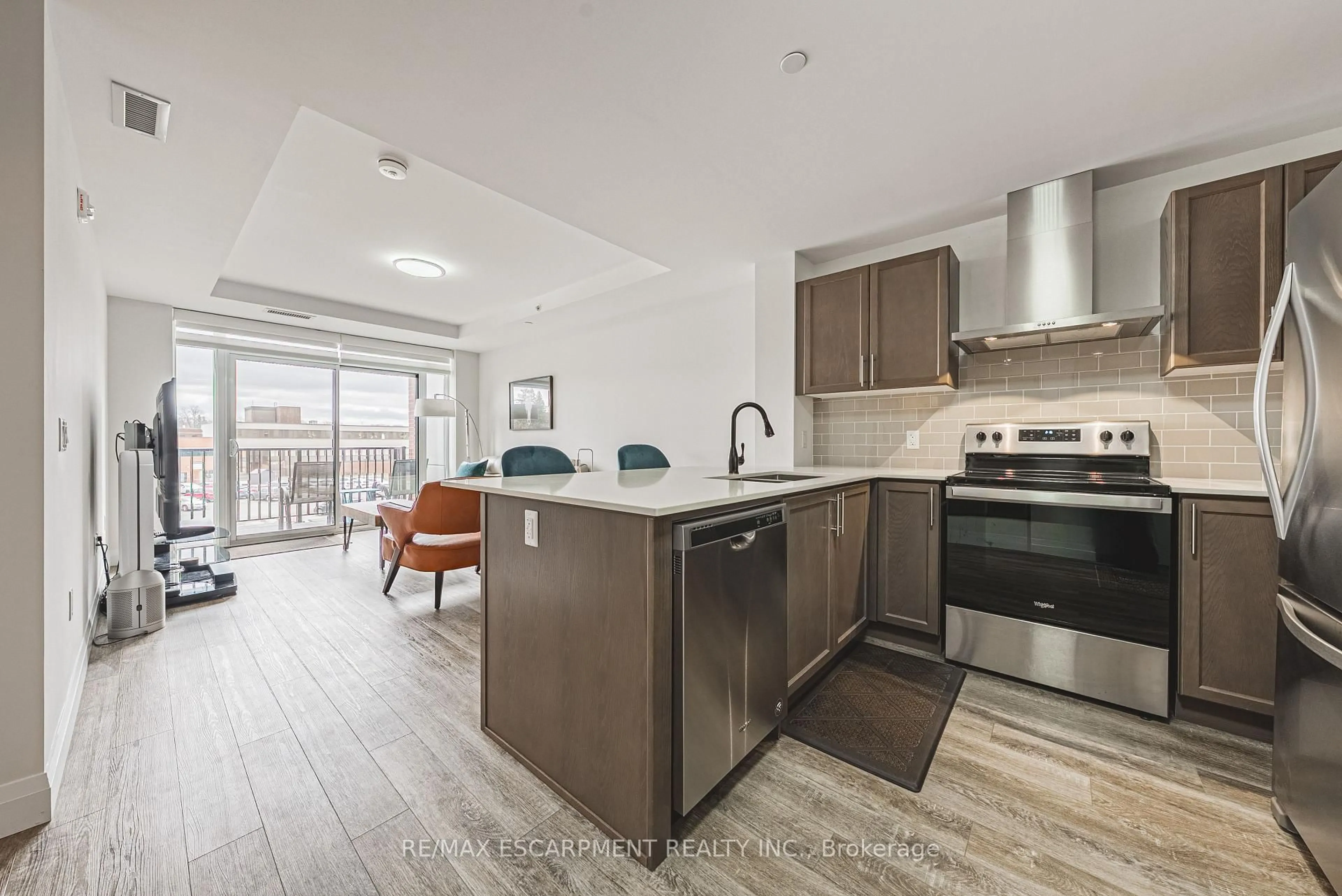 Open concept kitchen, unknown for 1 Redfern Ave #215, Hamilton Ontario L9C 0E6