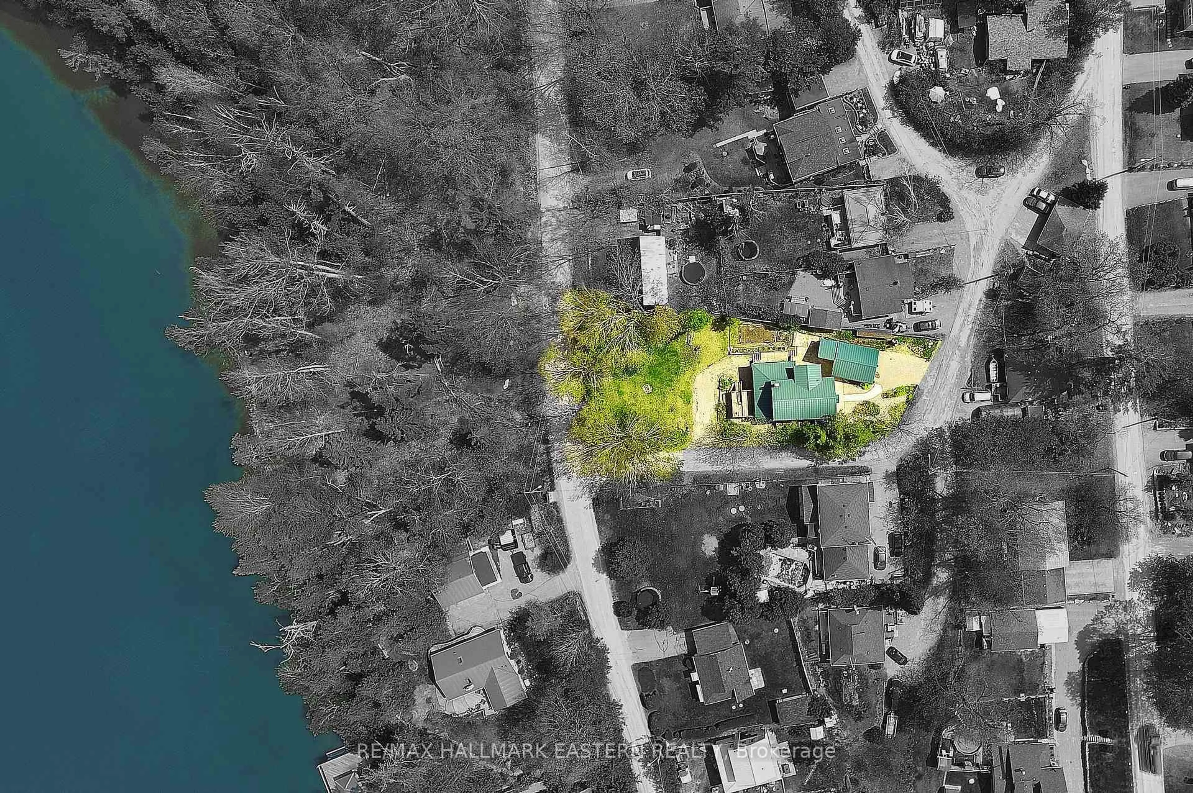 A pic from outside/outdoor area/front of a property/back of a property/a pic from drone, water/lake/river/ocean view for 1043 Lakeview Ave, Selwyn Ontario K0L 1H0