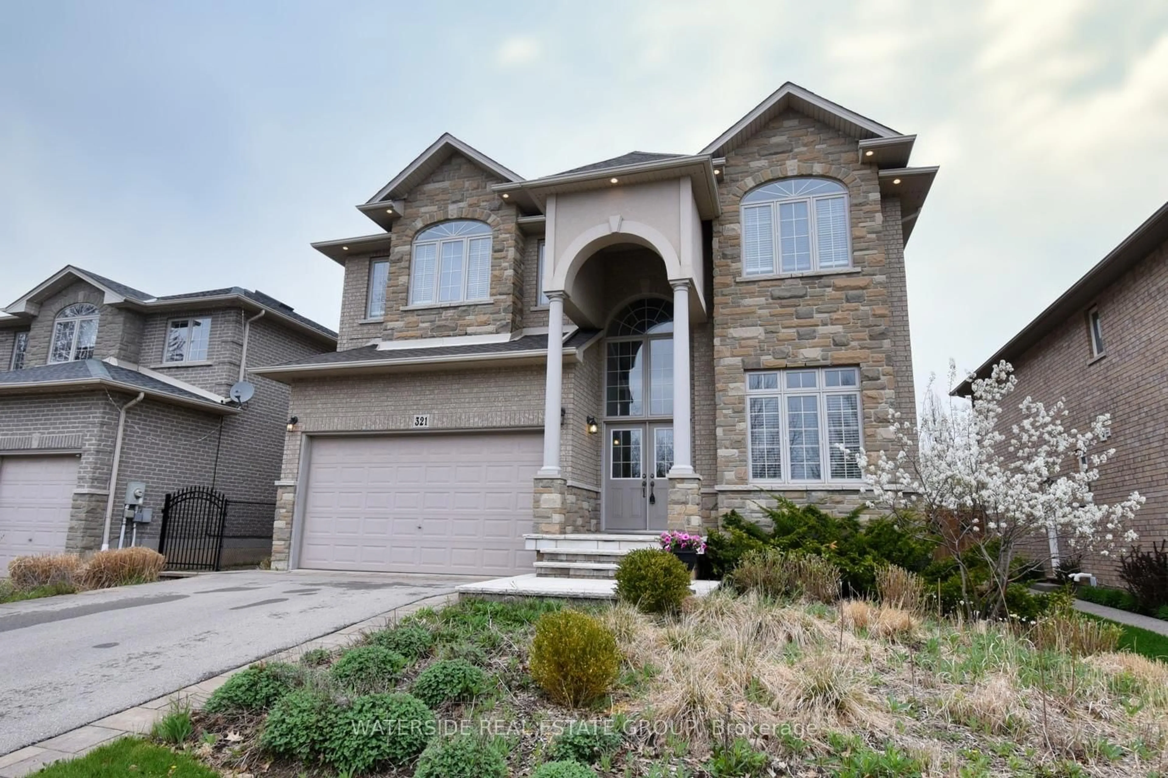 Home with brick exterior material, street for 321 Braithwaite Ave, Hamilton Ontario L9G 5A7