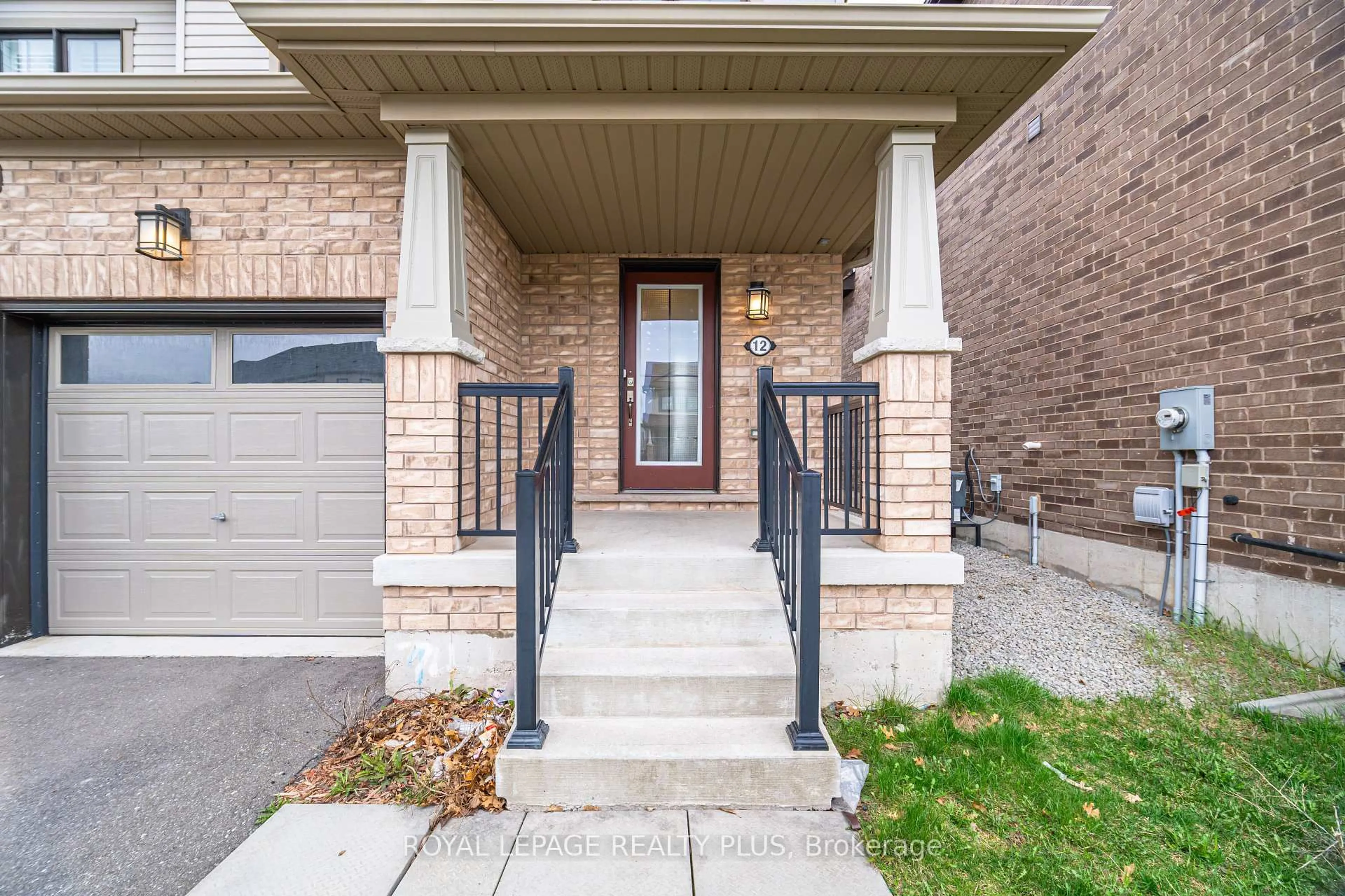 Home with brick exterior material, street for 12 Pagebrook Cres, Hamilton Ontario L8J 0K7