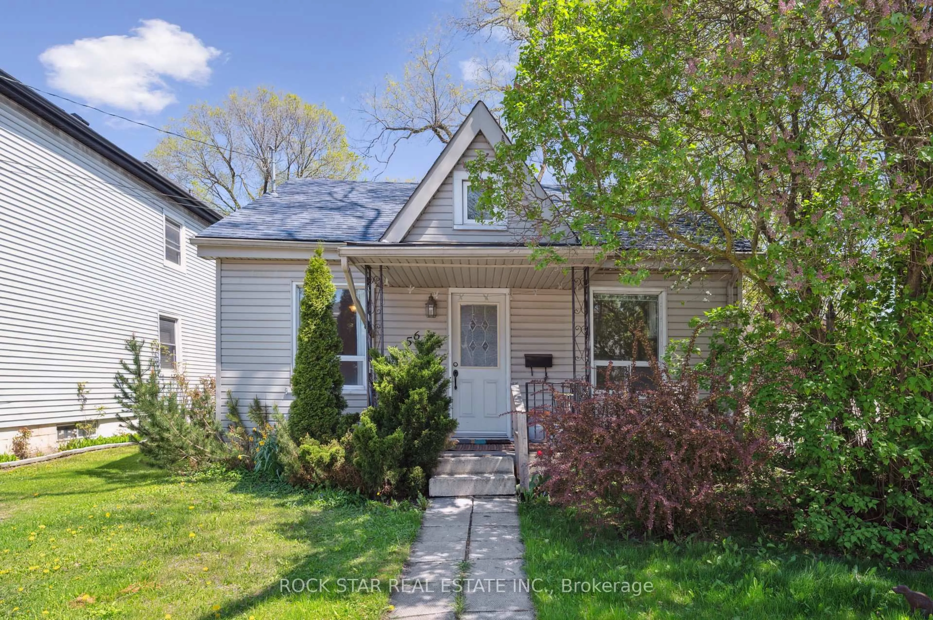 Home with vinyl exterior material, street for 56 Breadalbane St, Hamilton Ontario L8R 3G1