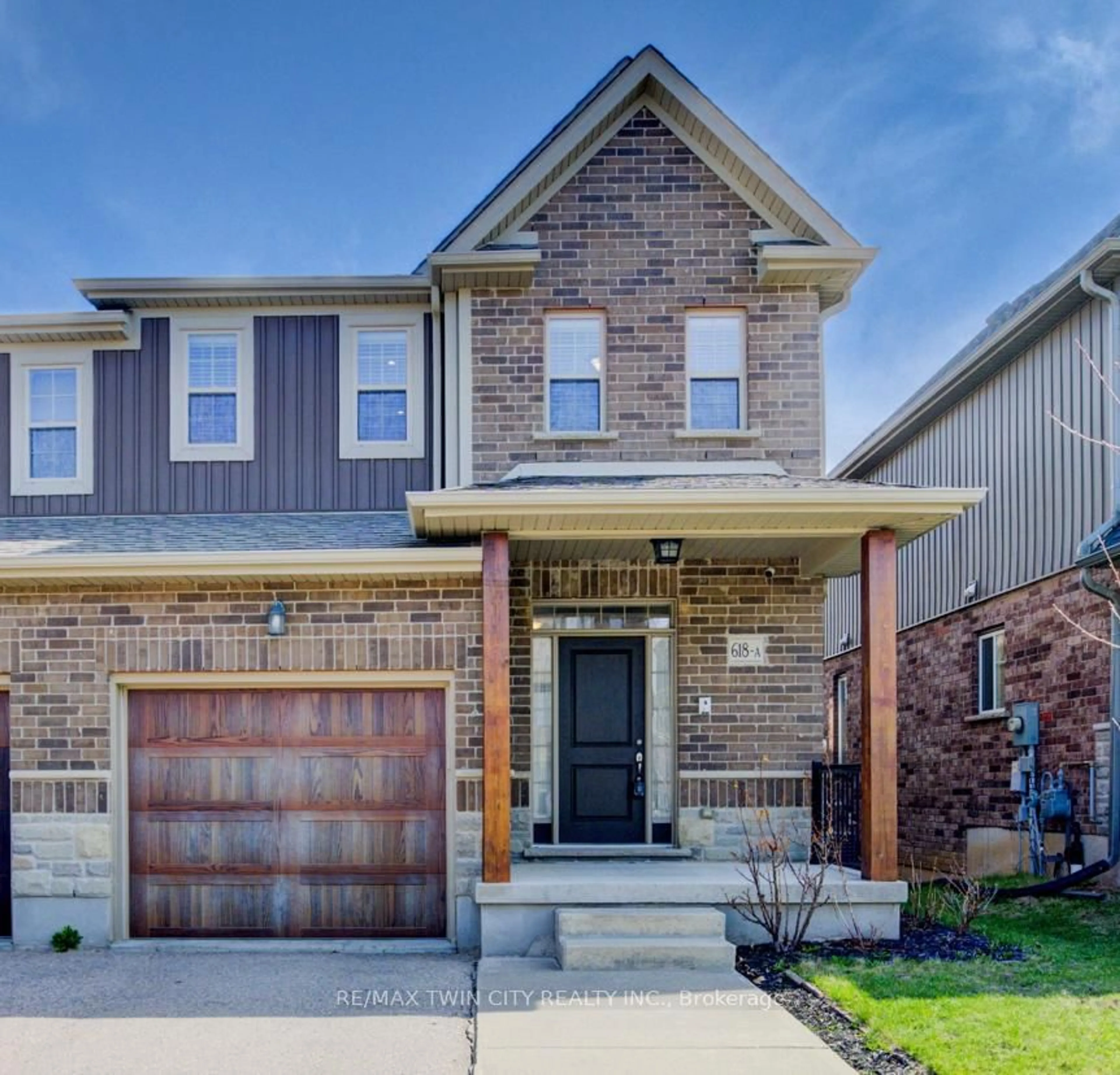 Home with brick exterior material, street for 618 MONTPELLIER Dr #A, Waterloo Ontario N2T 0B2