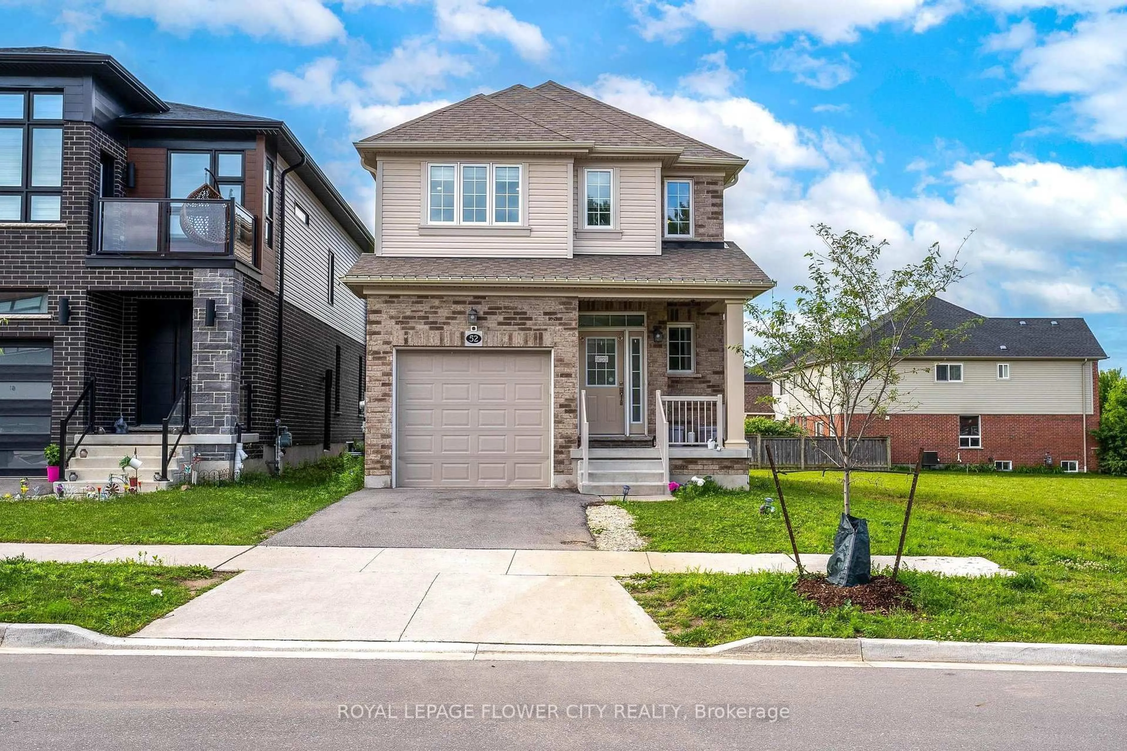 Home with brick exterior material, street for 52 Monarch woods Dr, Kitchener Ontario N2P 2Y9