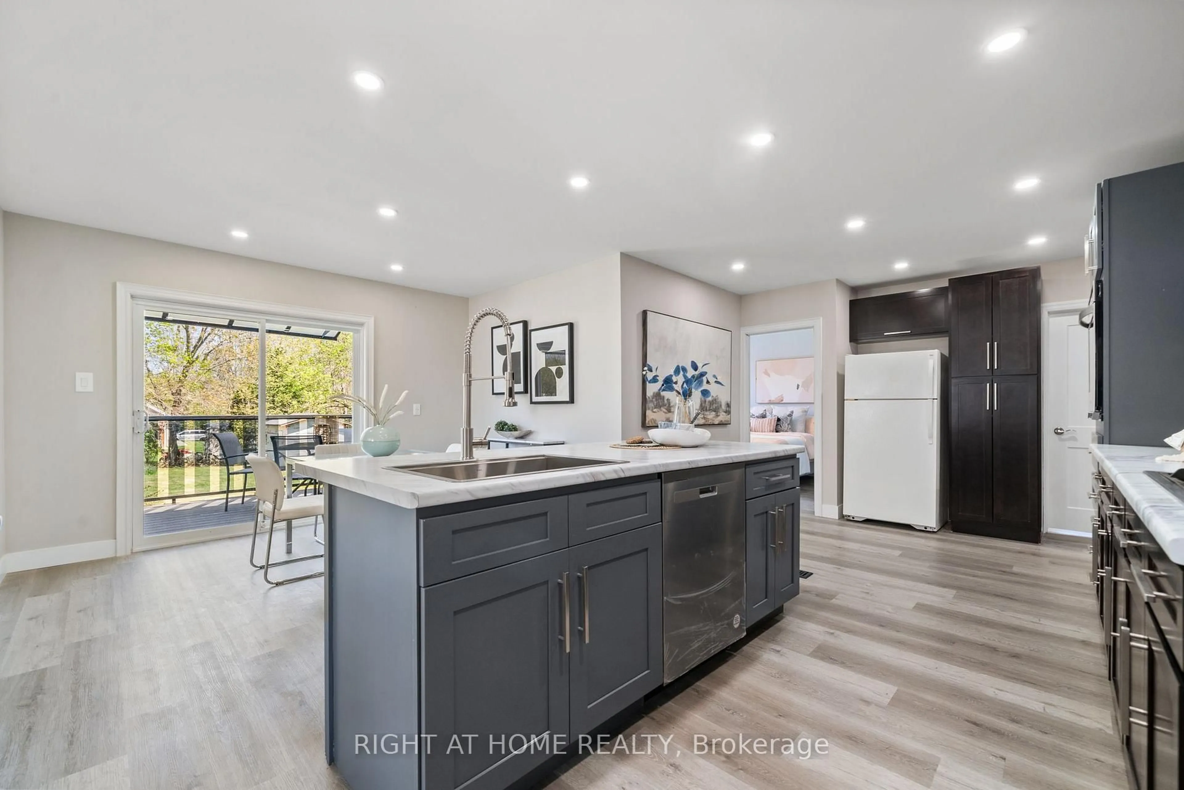 Open concept kitchen, ceramic/tile floor for 108 Forsyth St, Limoges Ontario K0K 2M0