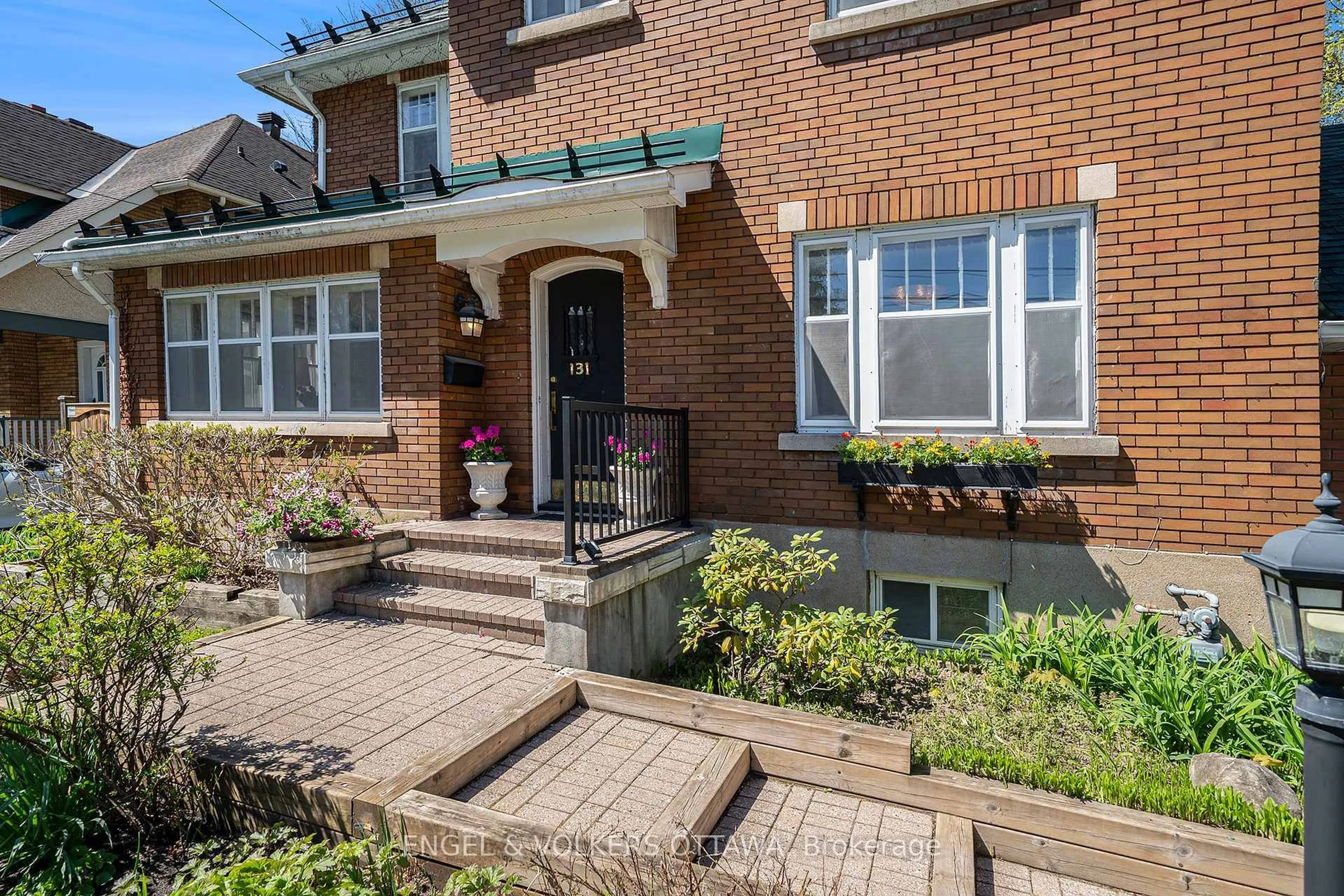Home with brick exterior material, street for 131 Acacia Ave, Ottawa Ontario K1M 0R2