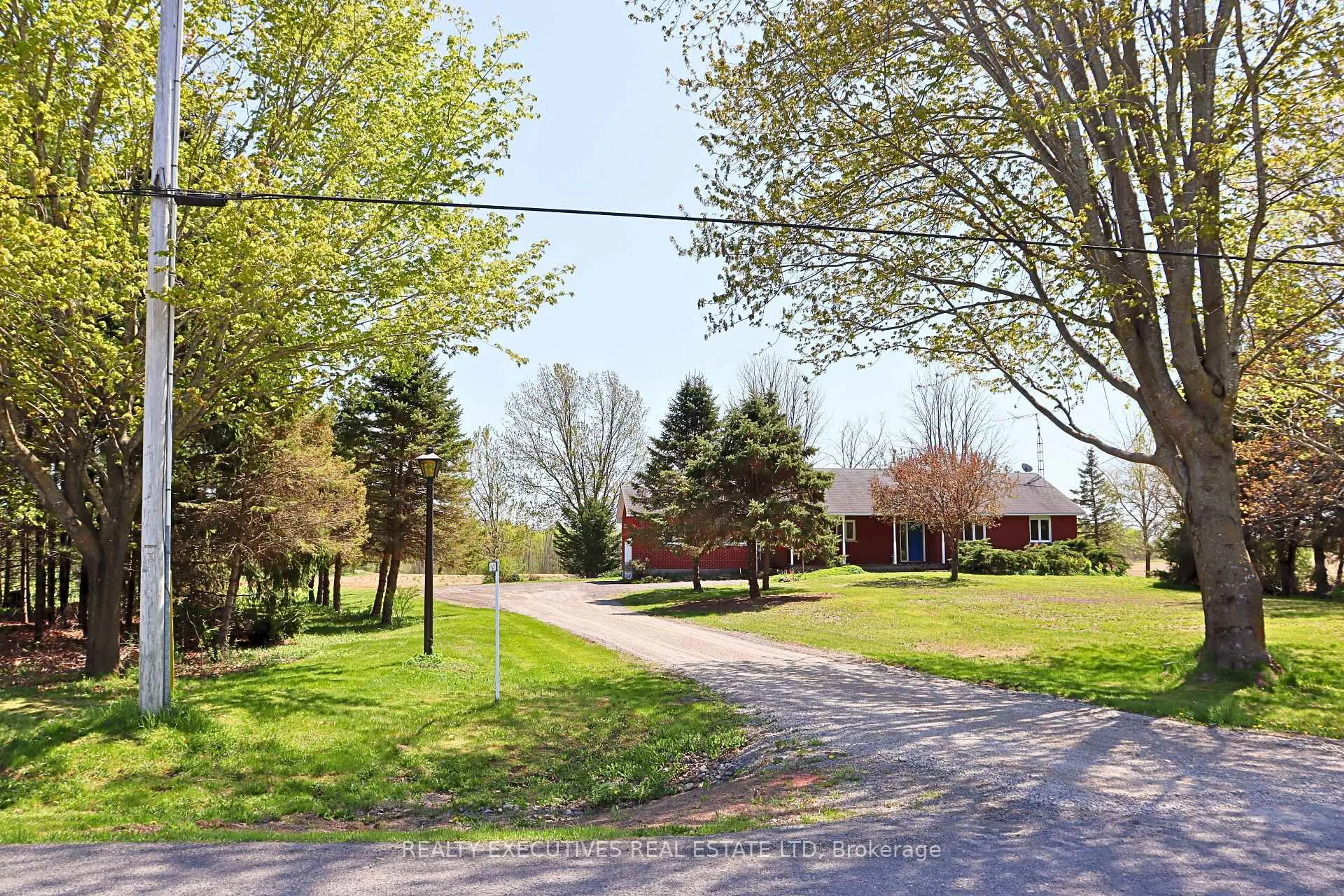 A pic from outside/outdoor area/front of a property/back of a property/a pic from drone, street for 10790 Van Camp Rd, North Dundas Ontario K0E 1S0