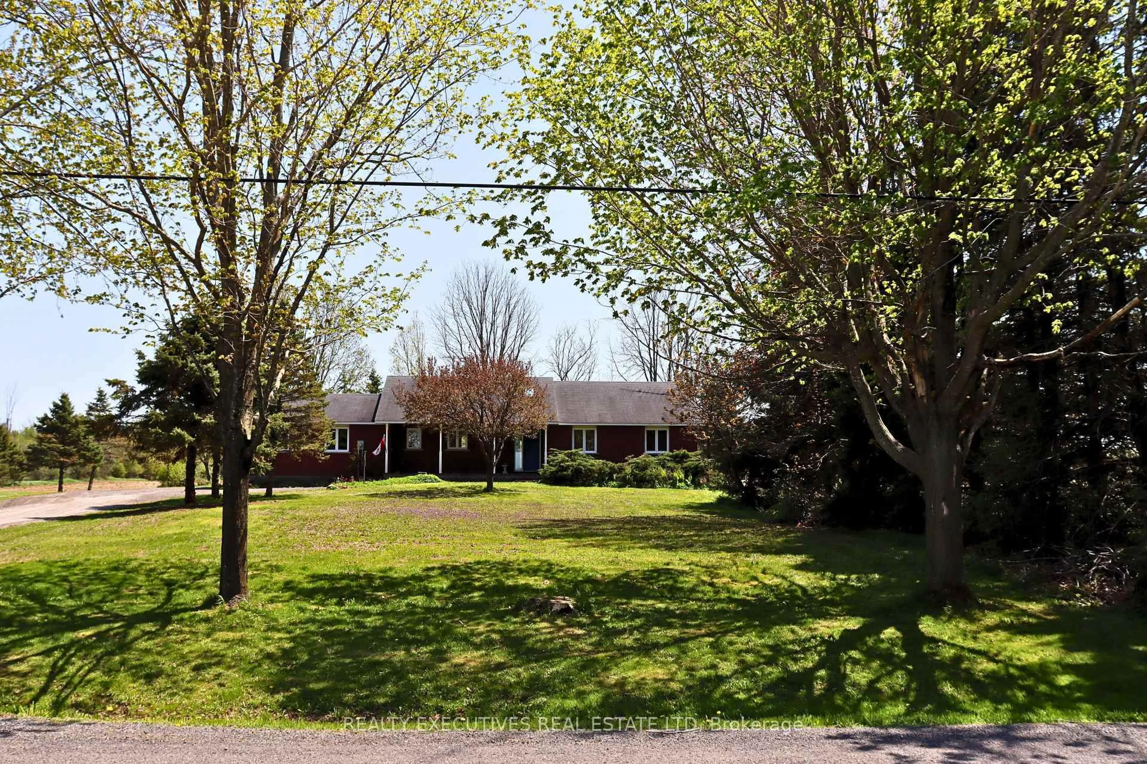 A pic from outside/outdoor area/front of a property/back of a property/a pic from drone, street for 10790 Van Camp Rd, North Dundas Ontario K0E 1S0