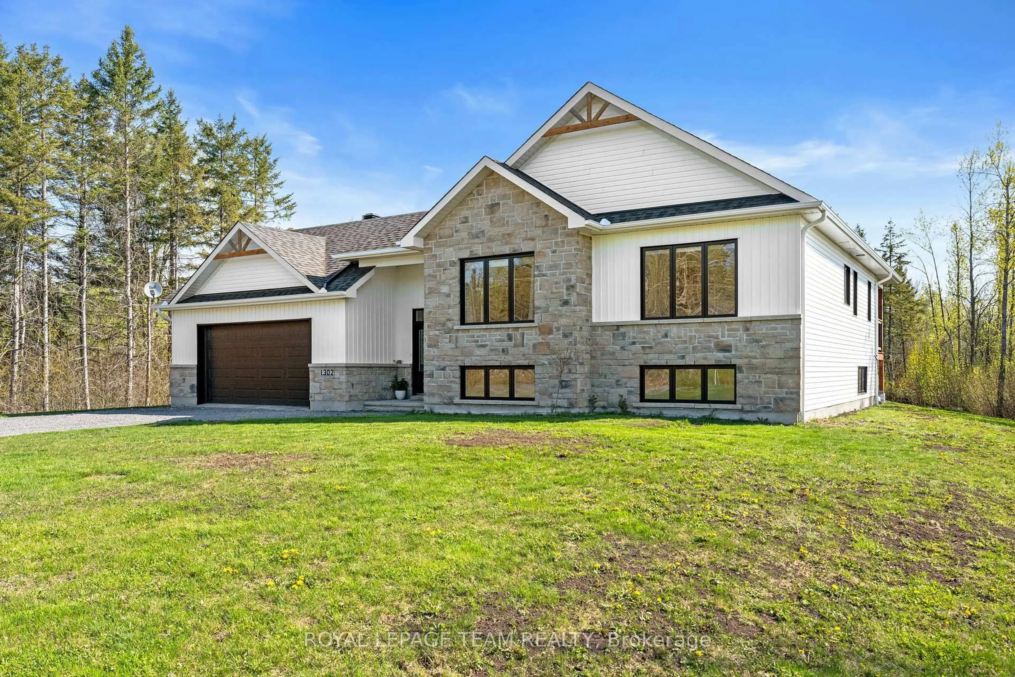 Home with brick exterior material, street for 1302 Country Lane, North Dundas Ontario K0C 2K0