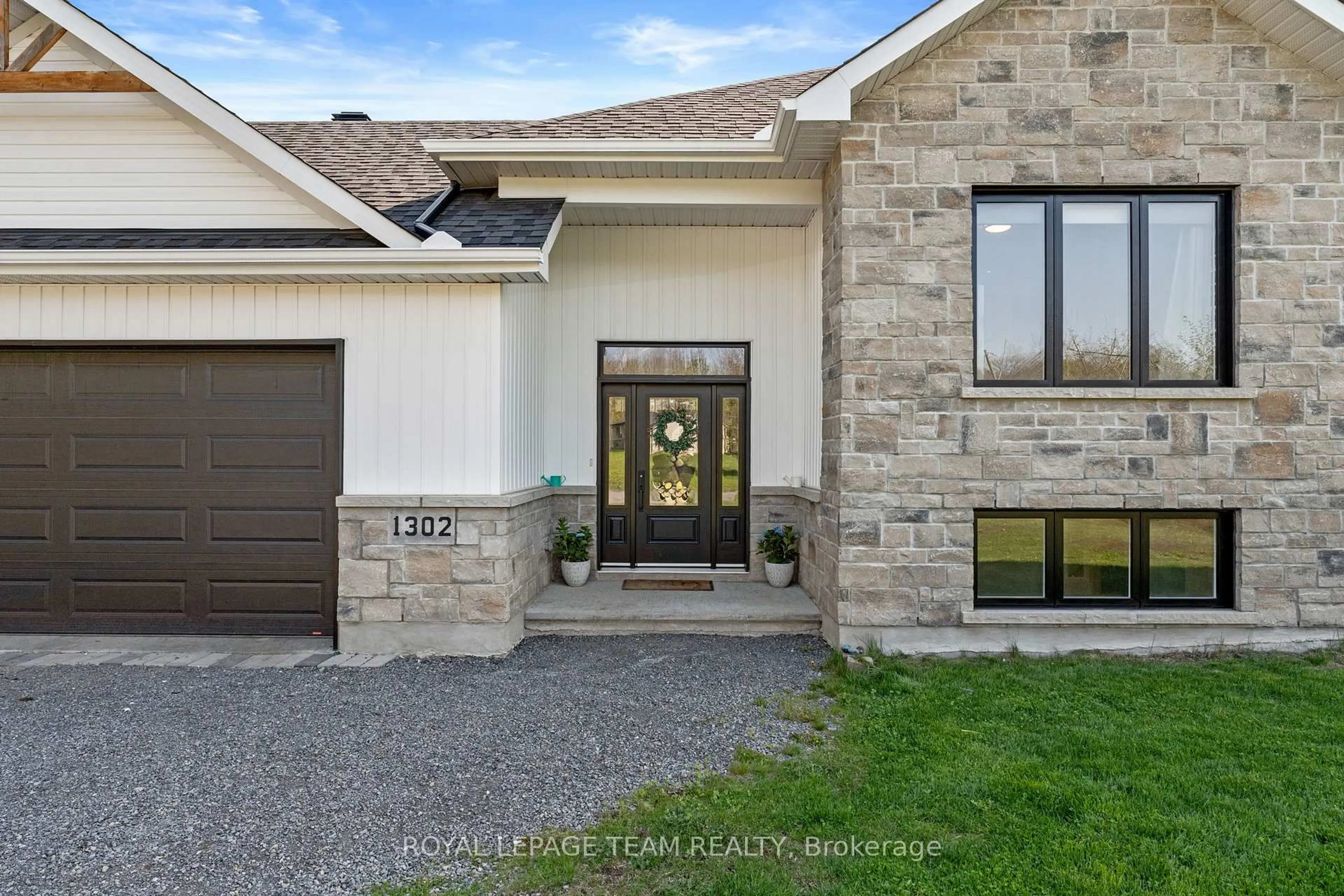Home with brick exterior material, street for 1302 Country Lane, North Dundas Ontario K0C 2K0