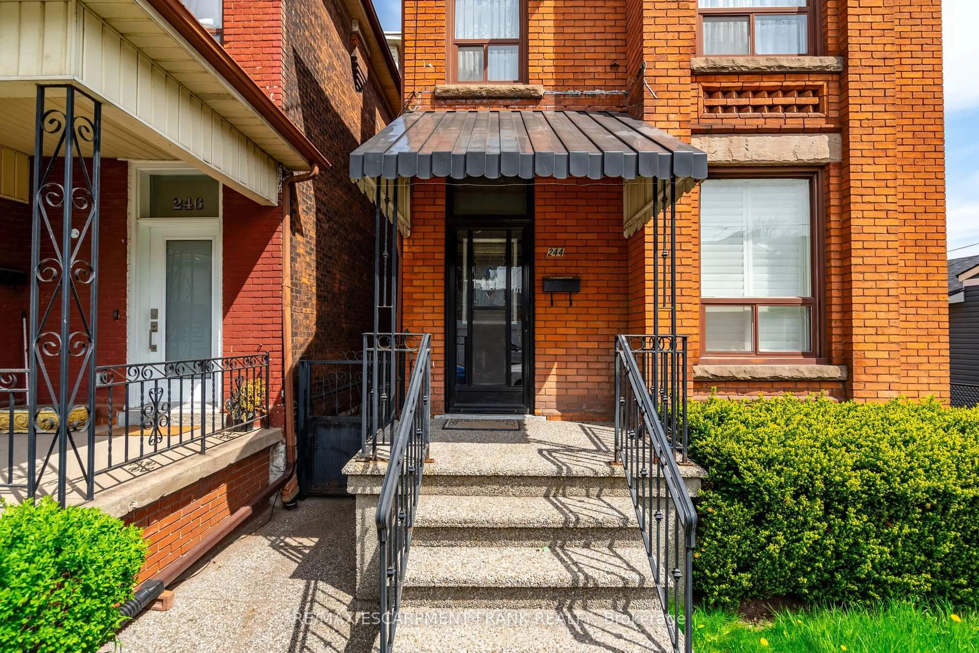 Home with brick exterior material, street for 244 HUGHSON St, Hamilton Ontario L8L 4M3